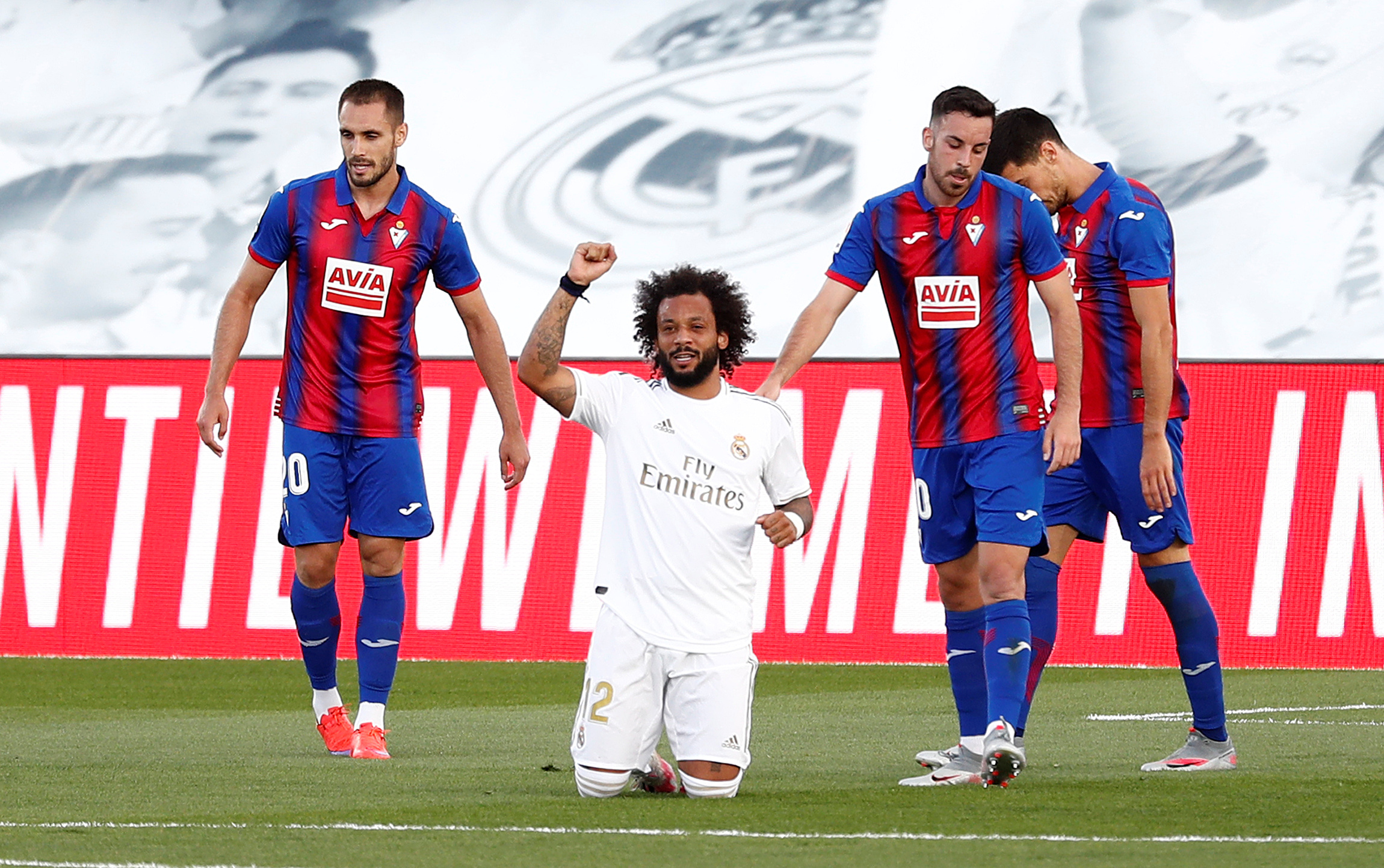 Soccer Football - La Liga Santander - Real Madrid v Eibar - Alfredo Di Stefano Stadium, Madrid, Spain - June 14, 2020   Real Madrid's Marcelo celebrates scoring their third goal, as play resumes behind closed doors following the outbreak of the coronavirus disease (COVID-19)   REUTERS