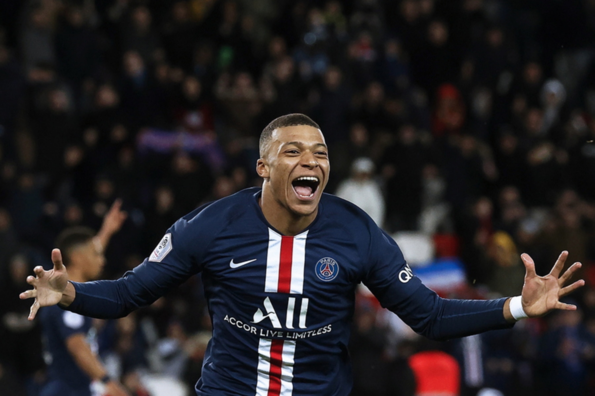 epa08260092 Paris Saint-Germain's Kylian Mbappe celebrates after scoring the 4-0 lead during the French Ligue 1 soccer match between Paris Saint-Germain (PSG) and Dijon FCO at the Parc des Princes stadium in Paris, France, 29 February 2020.  EPA