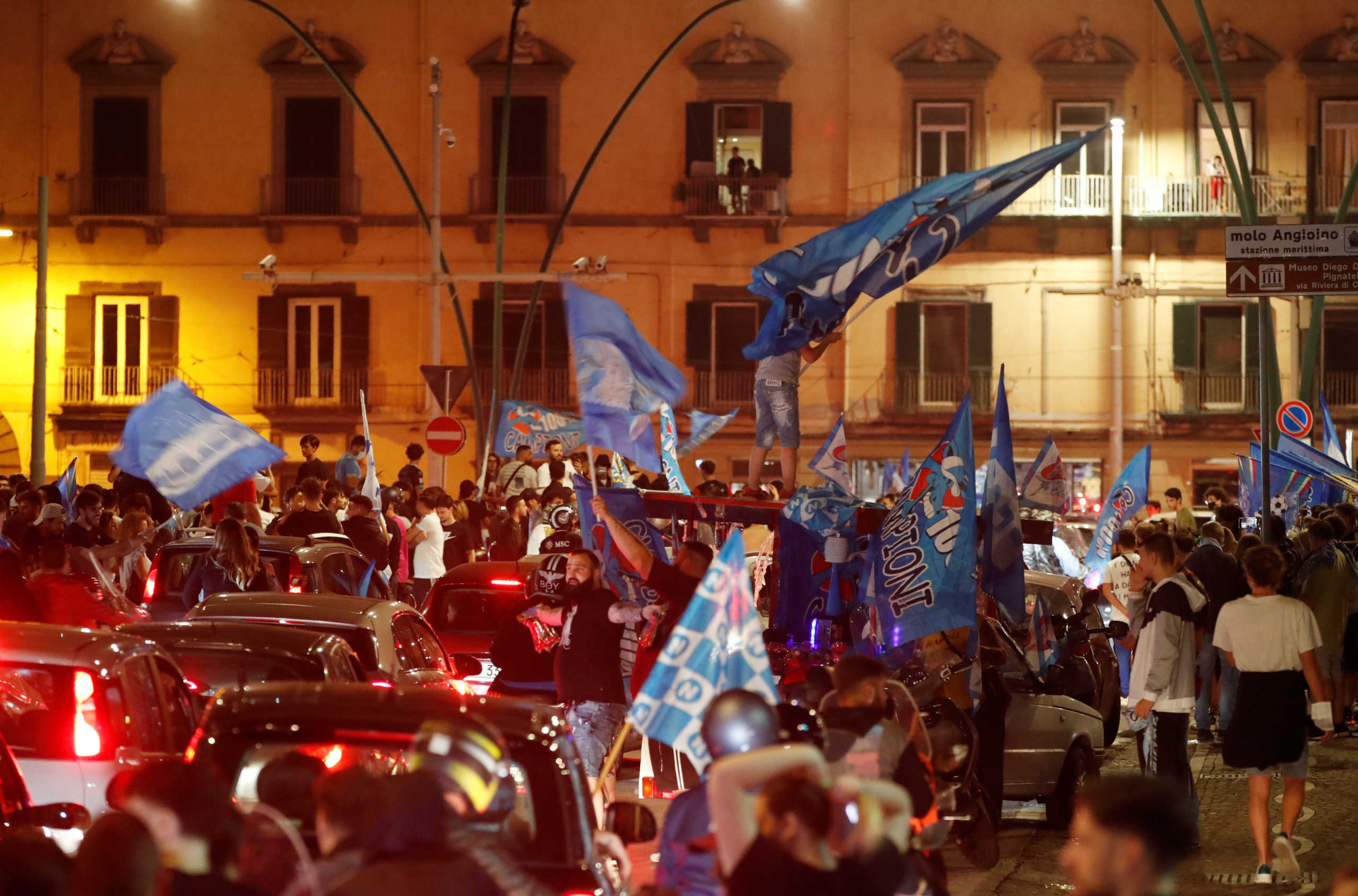 Soccer Football - Coppa Italia - Final - Napoli fans celebrate after winning the Coppa Italia in Naples, Napoli v Juventus - Naples, Italy - June 17, 2020   Napoli fans celebrate after winning the Coppa Italia Final, following the outbreak of the coronavirus disease (COVID-19)   REUTERS