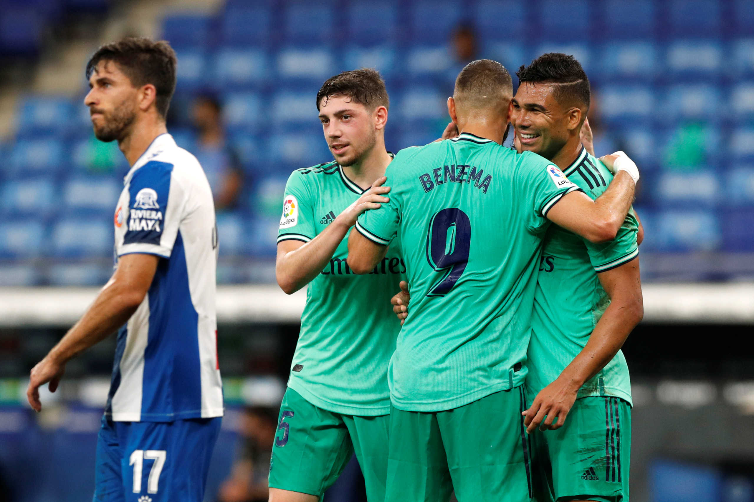 Soccer Football - La Liga Santander - Espanyol v Real Madrid - RCDE Stadium, Barcelona, Spain - June 28, 2020  Real Madrid's Casemiro celebrates scoring their first goal with teammates, as play resumes behind closed doors following the outbreak of the coronavirus disease (COVID-19)   REUTERS
