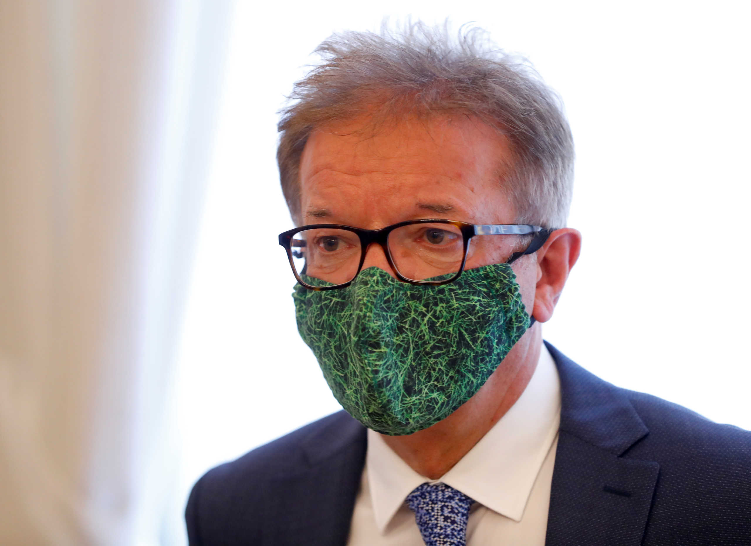 Austrian Health Minister Rudolf Anschober wearing a protective face mask attends a news conference during the coronavirus disease (COVID-19) outbreak in Vienna, Austria, June 3, 2020.   REUTERS