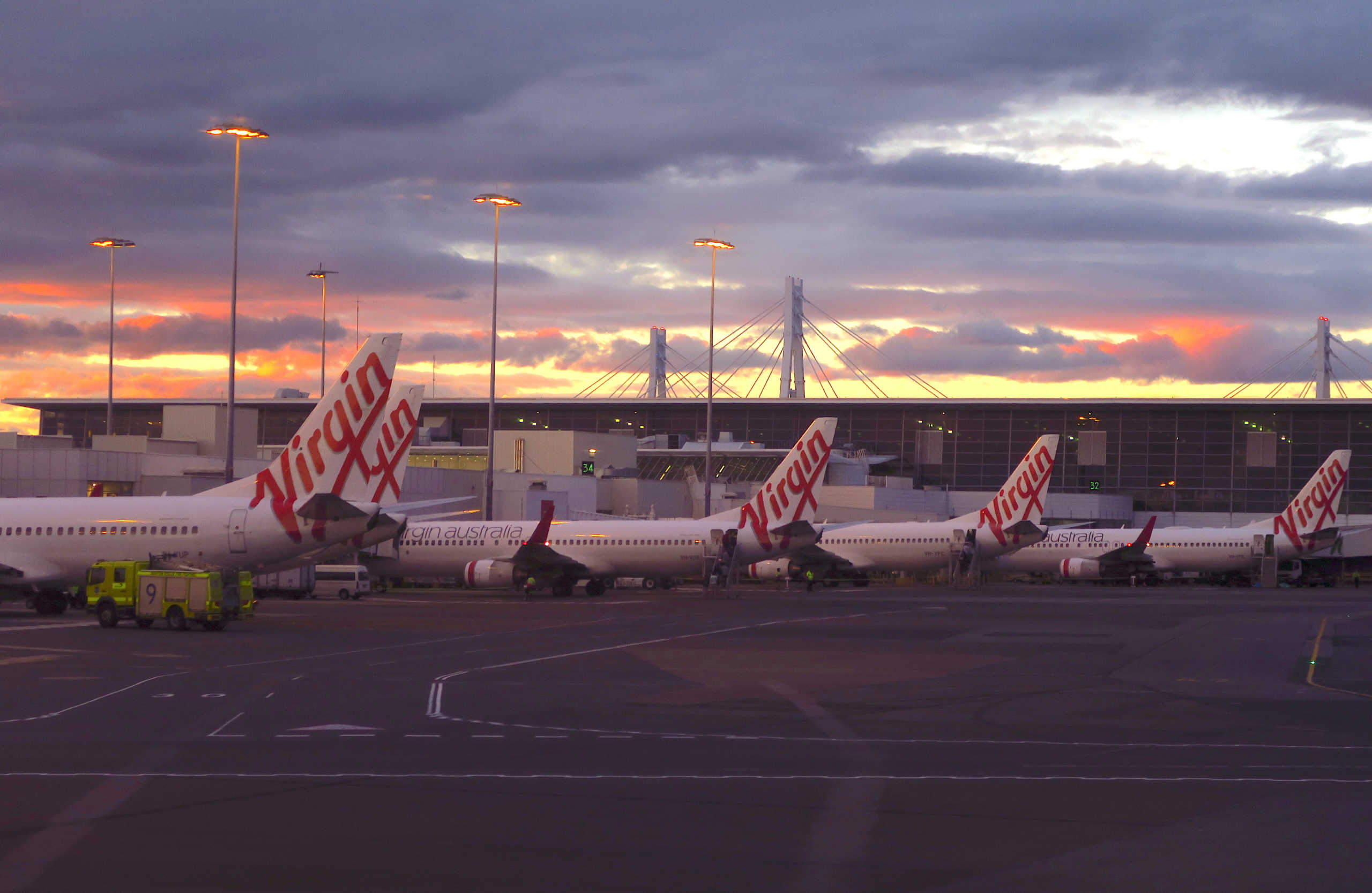 FILE PHOTO: FILE PHOTO: Aircraft from Virgin Australia sit on the tarmac at the domestic terminal of Sydney Airport in Australia, August 19, 2018. Picture taken August 19, 2018.  REUTERS
