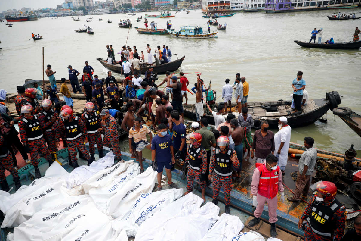Dead bodies are seen piled up on a boat after a passenger ferry capsized in the river Buriganga in Dhaka, Bangladesh, June 29, 2020. REUTERS