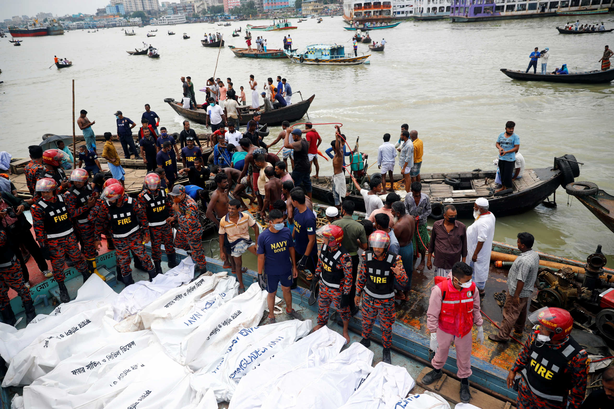 Dead bodies are seen piled up on a boat after a passenger ferry capsized in the river Buriganga in Dhaka, Bangladesh, June 29, 2020. REUTERS