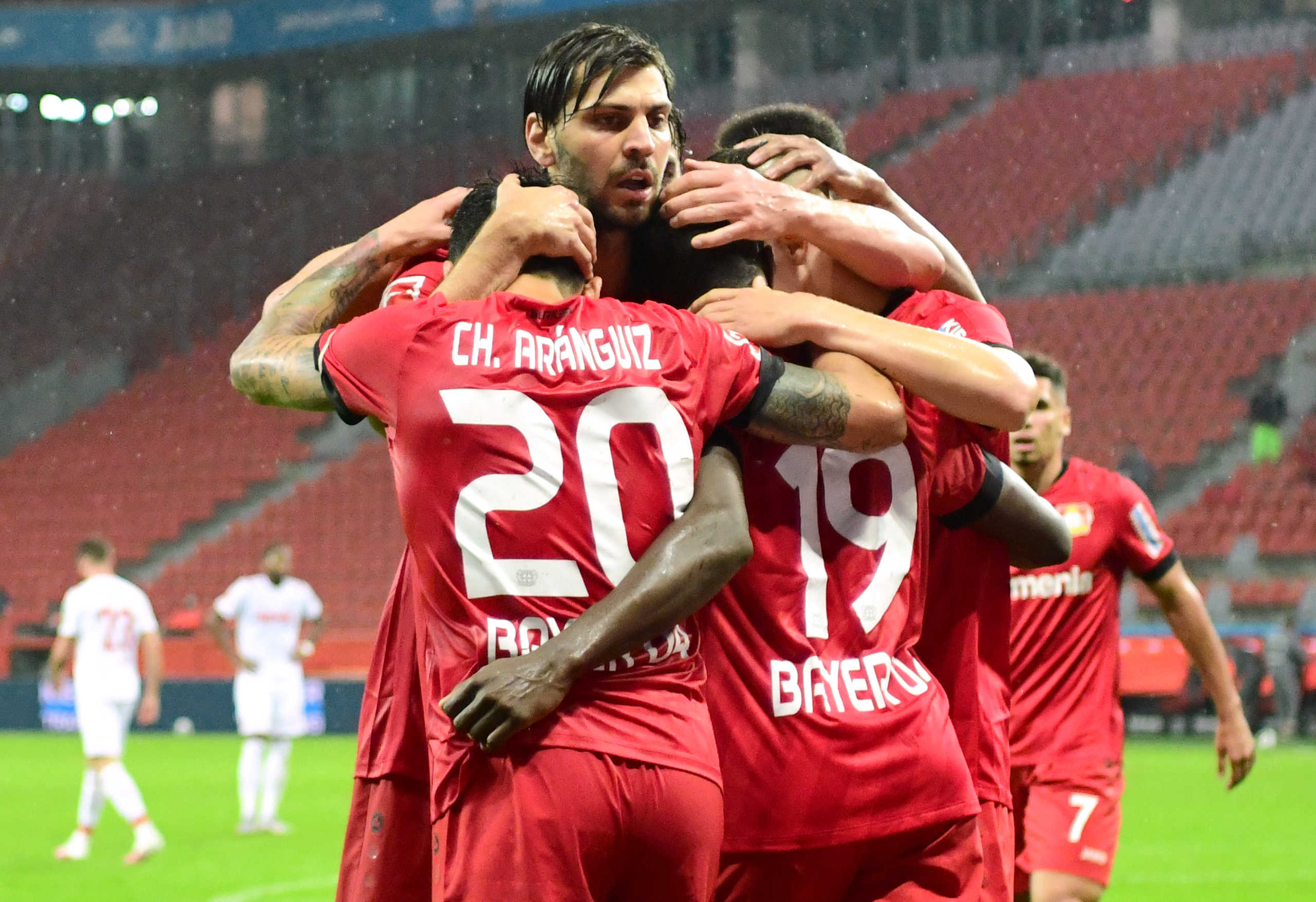 Soccer Football - Bundesliga - Bayer Leverkusen v FC Cologne - BayArena, Leverkusen, Germany - June 17, 2020 Leverkusen's Moussa Diaby celebrates scoring their third goal with teammates, following the resumption of play behind closed doors after the outbreak of the coronavirus disease (COVID-19)  Ina Fassbender