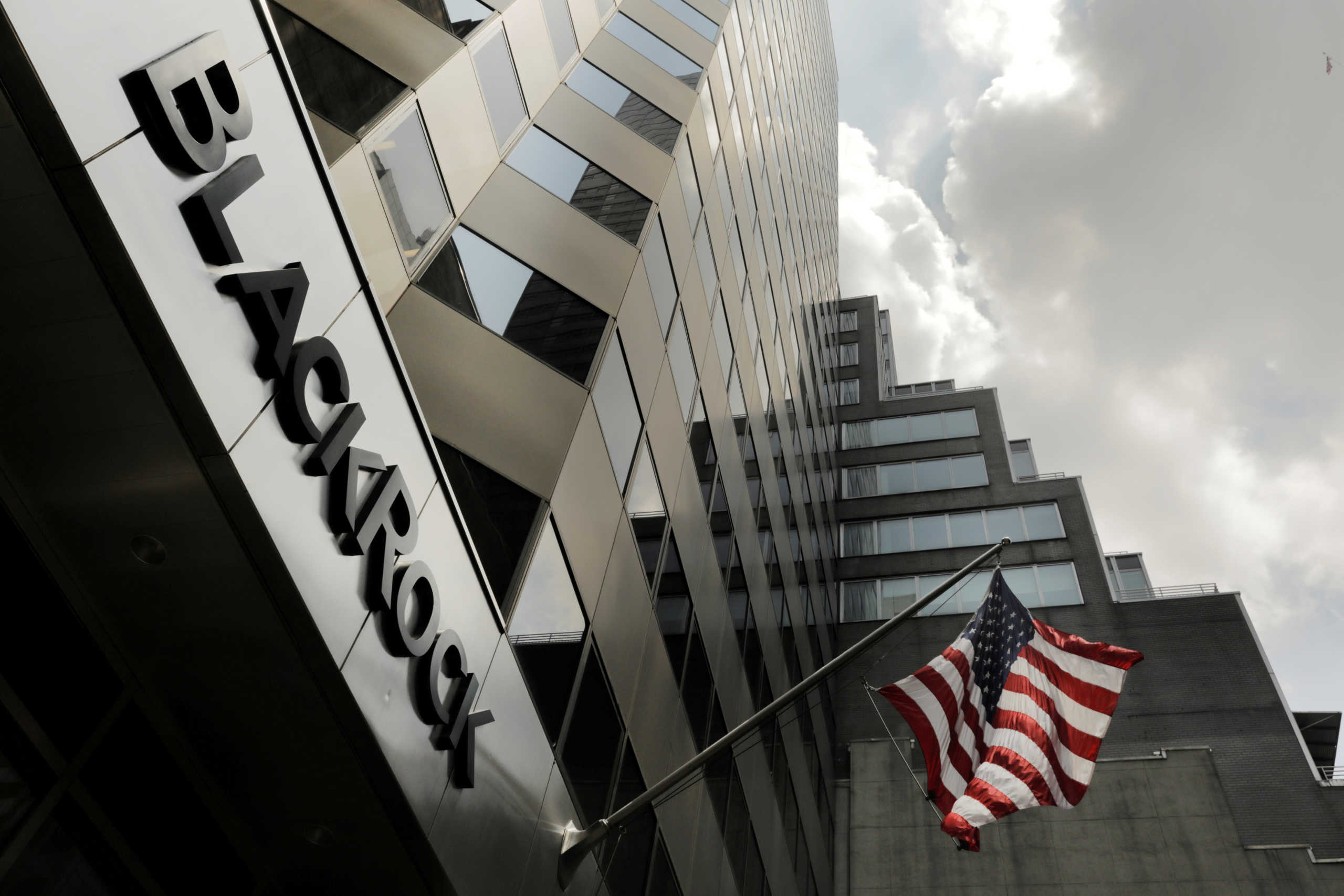 FILE PHOTO: A sign for BlackRock Inc hangs above their building in New York U.S., July 16, 2018. To match Special Report USA-FUNDS