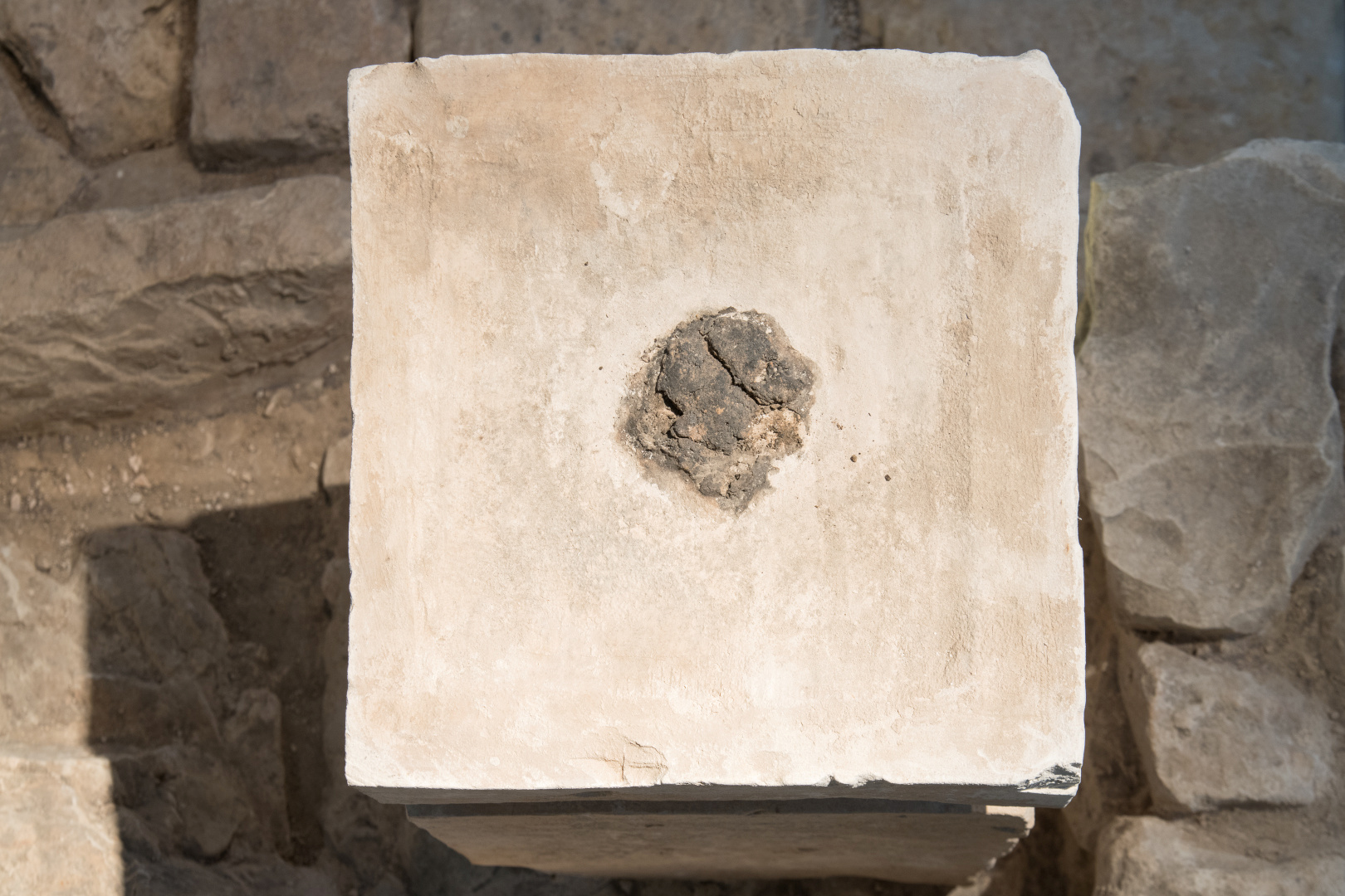 The top of an altar from an ancient religious shrine discovered in southern Israel, on which Israeli researchers say residues of cannabis and animal dung have been found, is seen on display at Israel Museum in Jerusalem, in this undated handout photograph received by Reuters on June 1, 2020. Laura Lachman