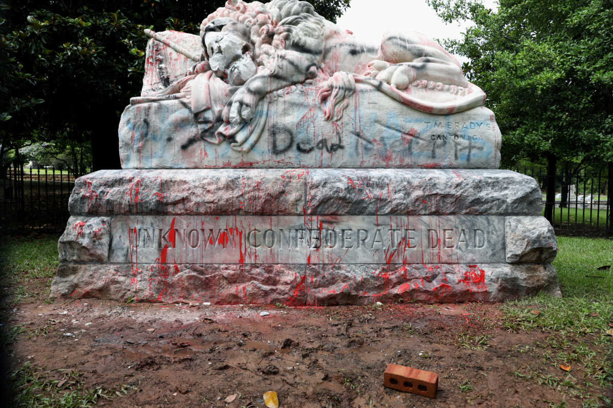 A vandalized monument to Unknown Confederate Dead is seen in Oakland Cemetery as protesters rally against racial inequality in Atlanta, Georgia, U.S. June 10, 2020. REUTERS