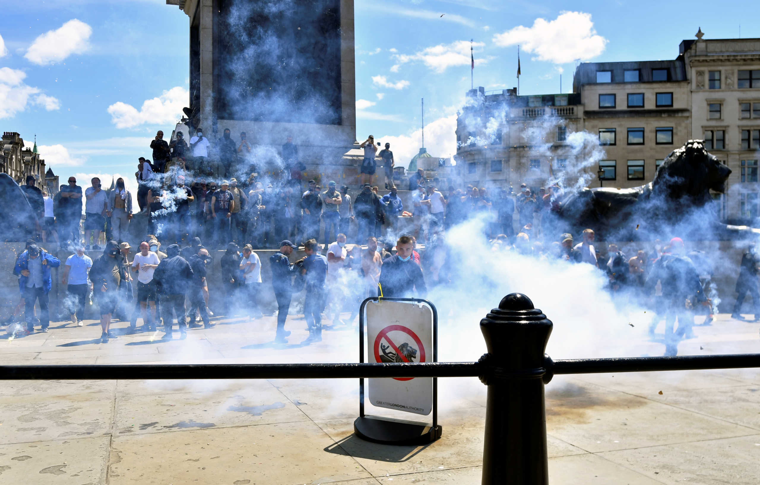 Counter-protesters stand under Nelson's Column in Trafalgar Square ahead of a Black Lives Matter protest following the death of George Floyd in Minneapolis police custody, in London, Britain, June 13, 2020. REUTERS