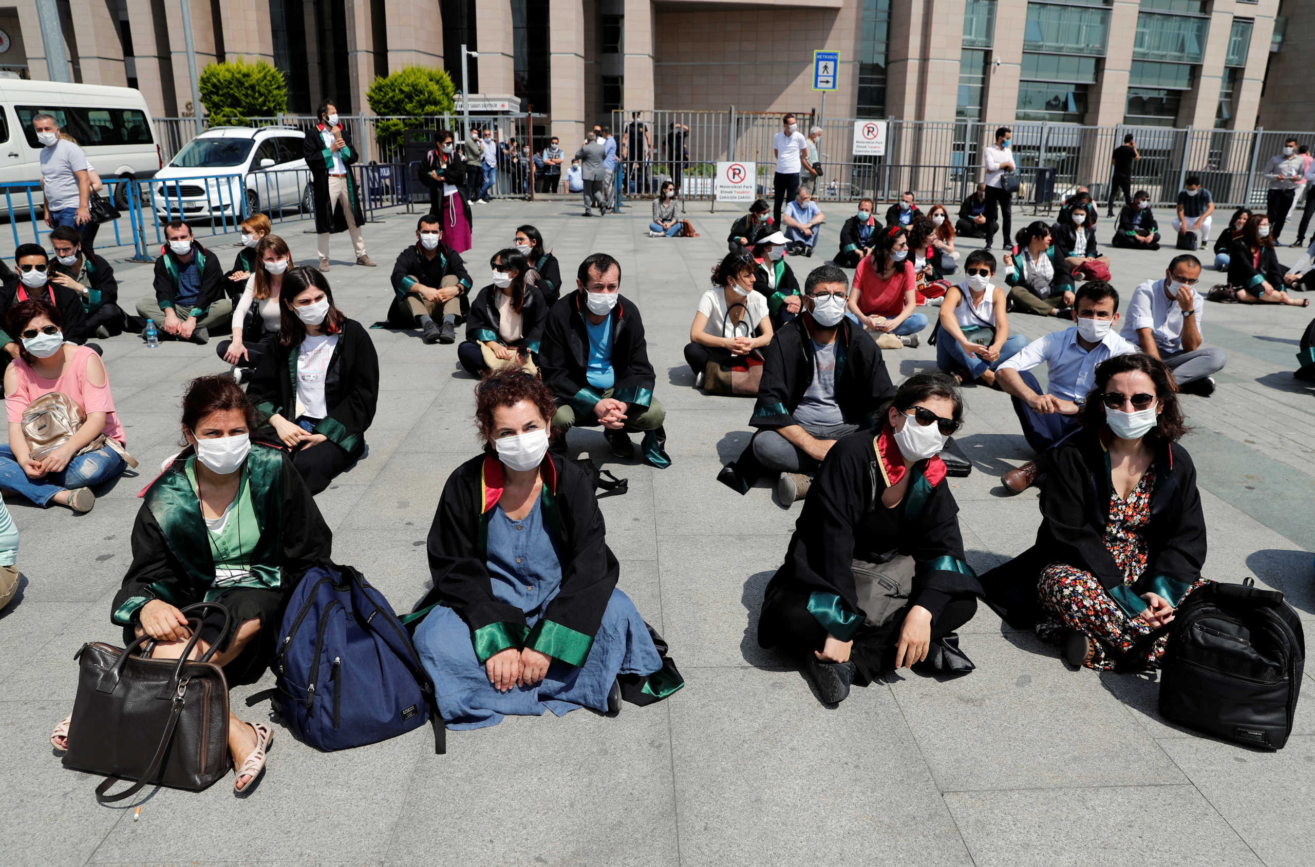 Lawyers gather in front of the Justice Palace to demonstrate against the police stopping senior lawyers marching to the capital Ankara in a protest against a draft bill governing the organisation of bar associations, in Istanbul, Turkey June 22, 2020. REUTERS