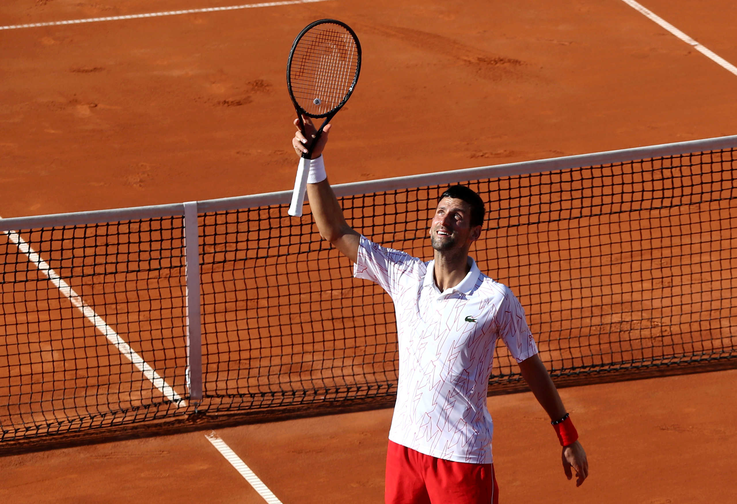 FILE PHOTO: Tennis - Adria Tour - Belgrade, Serbia - June 14, 2020   Serbia's Novak Djokovic celebrates winning his match against Germany's Alexander Zverev   REUTERS
