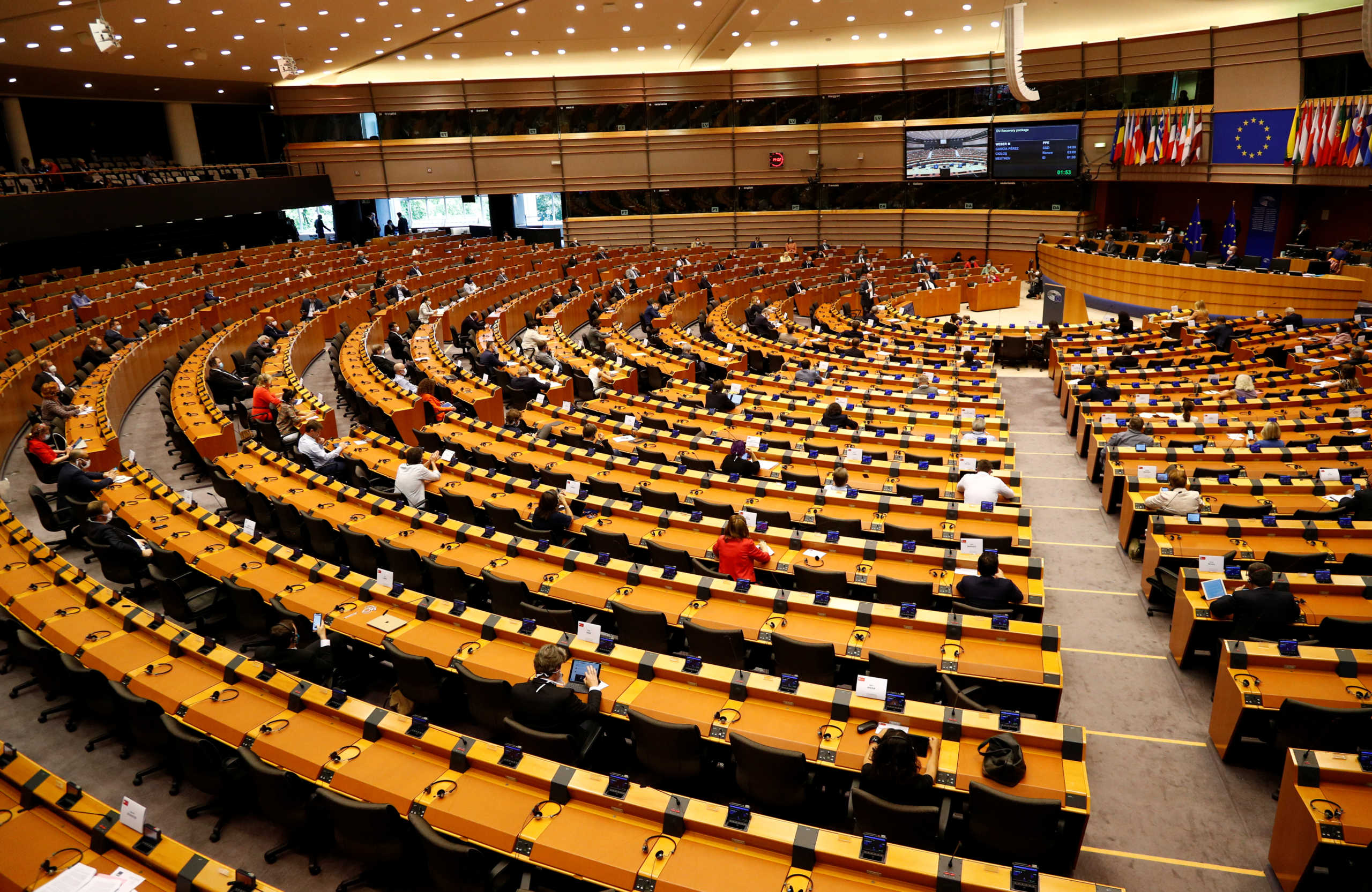 Members of the European Parliament are seen during a plenary session on a new proposal for the EU's joint 2021-27 budget and an accompanying Recovery Instrument to kickstart economic activity in the bloc ravaged by the coronavirus disease (COVID-19) outbreak, in Brussels, Belgium, May 27, 2020.  REUTERS