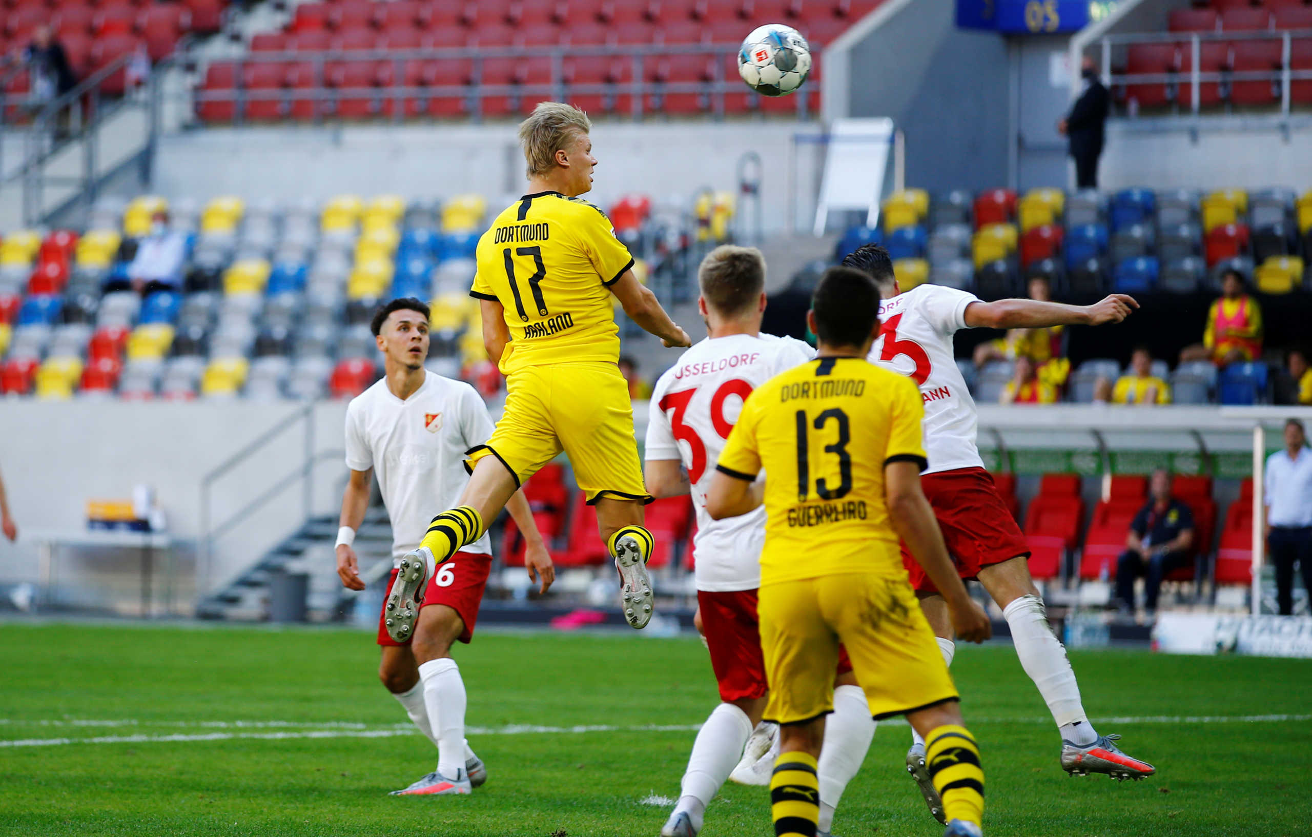 Soccer Football - Bundesliga - Fortuna Dusseldorf v Borussia Dortmund - Merkur Spiel-Arena, Dusseldorf, Germany - June 13, 2020  Borussia Dortmund's Erling Braut Haaland scores their first goal, as play resumes behind closed doors following the outbreak of the coronavirus disease (COVID-19)  REUTERS