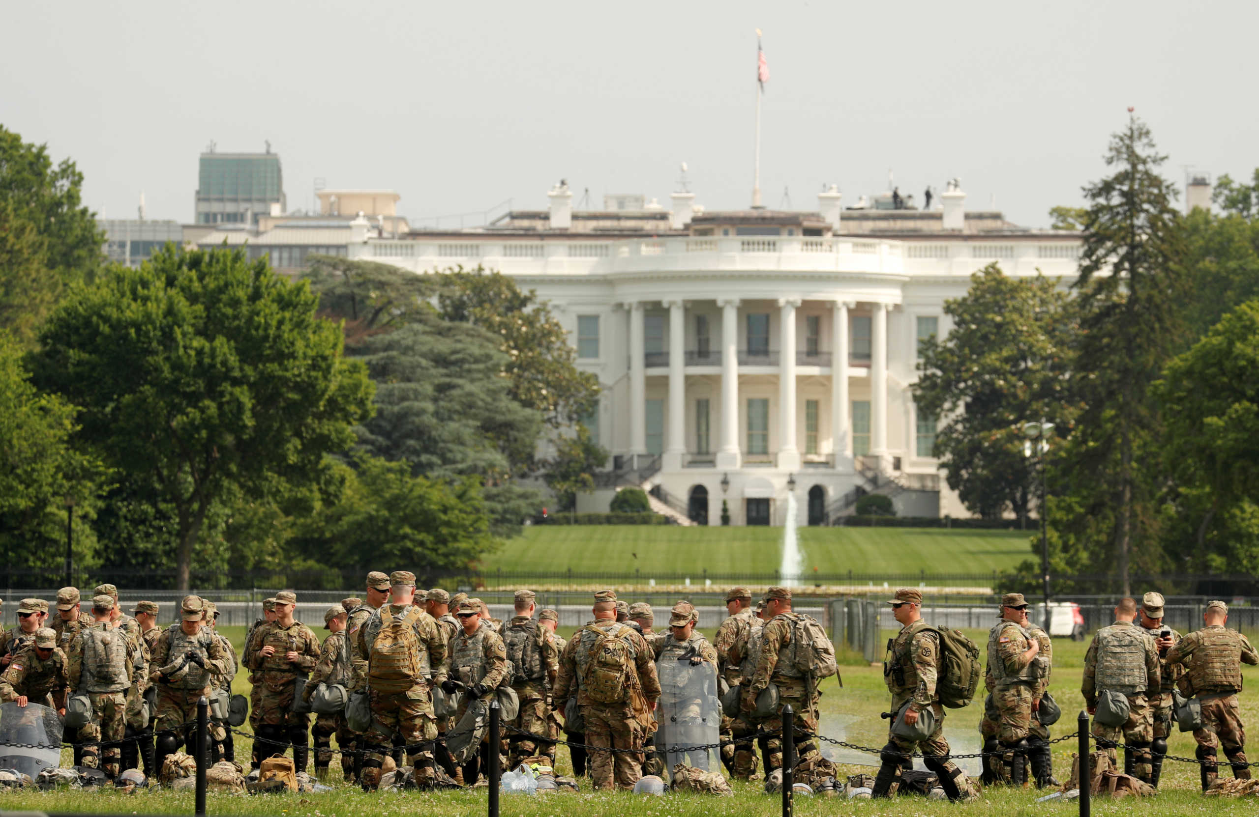 Uniformed military personnel stands in front of the White House ahead of a protest against racial inequality in the aftermath of the death in Minneapolis police custody of George Floyd, in Washington, U.S. June 6, 2020. REUTERS