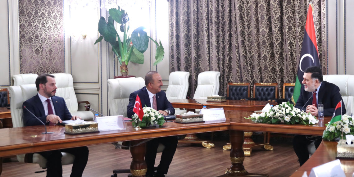 Libya's internationally recognised Prime Minister Fayez al-Serraj is seen with Turkey's Foreign Minister Mevlut Cavusoglu and Finance Minister Berat Albayrak during their meeting in Tripoli, Libya June 17, 2020. Turkish Foreign Ministry