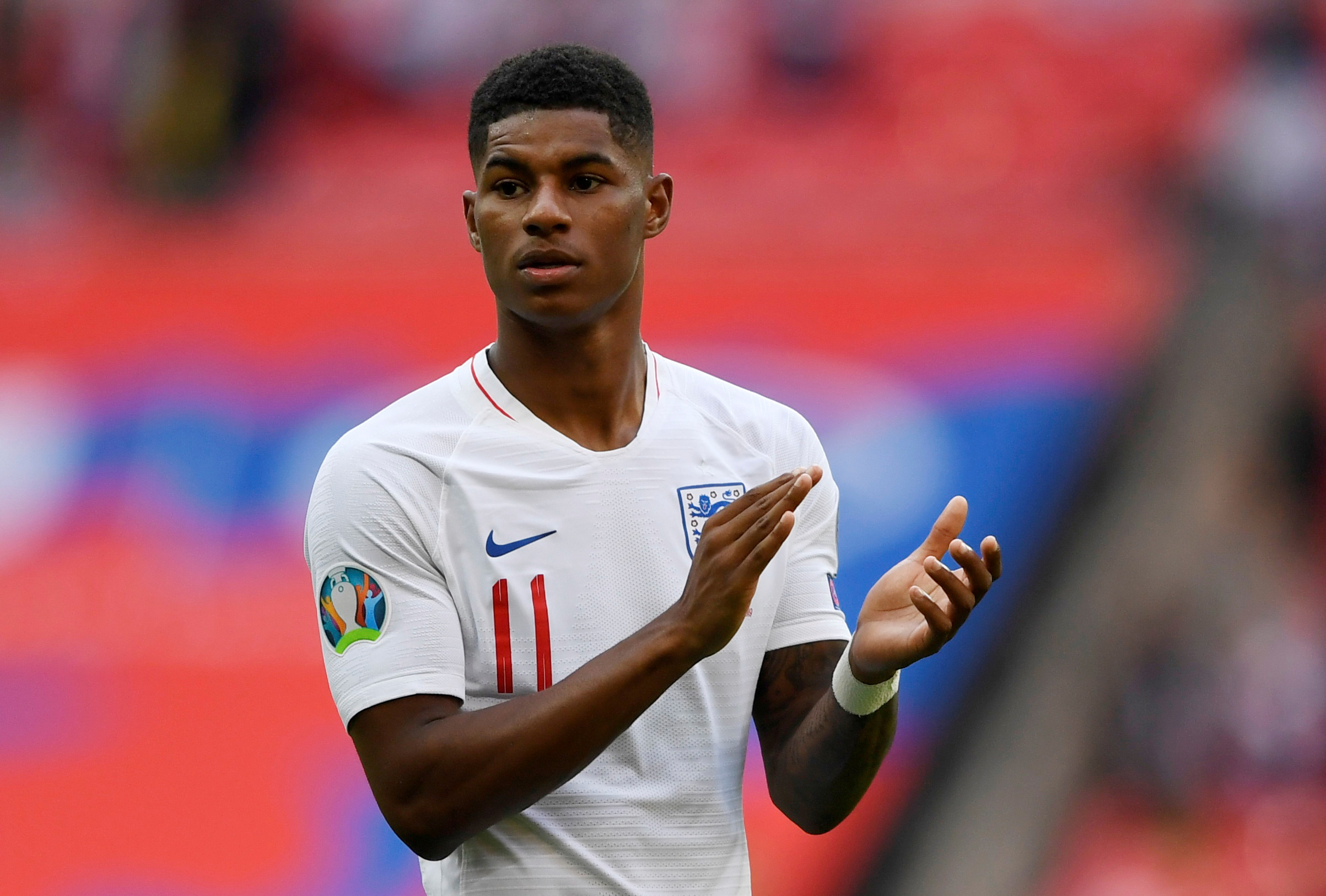 FILE PHOTO: Soccer Football - Euro 2020 Qualifier - Group A - England v Bulgaria - Wembley Stadium, London, Britain - September 7, 2019  England's Marcus Rashford applauds the fans after the match   Action Images via Reuters