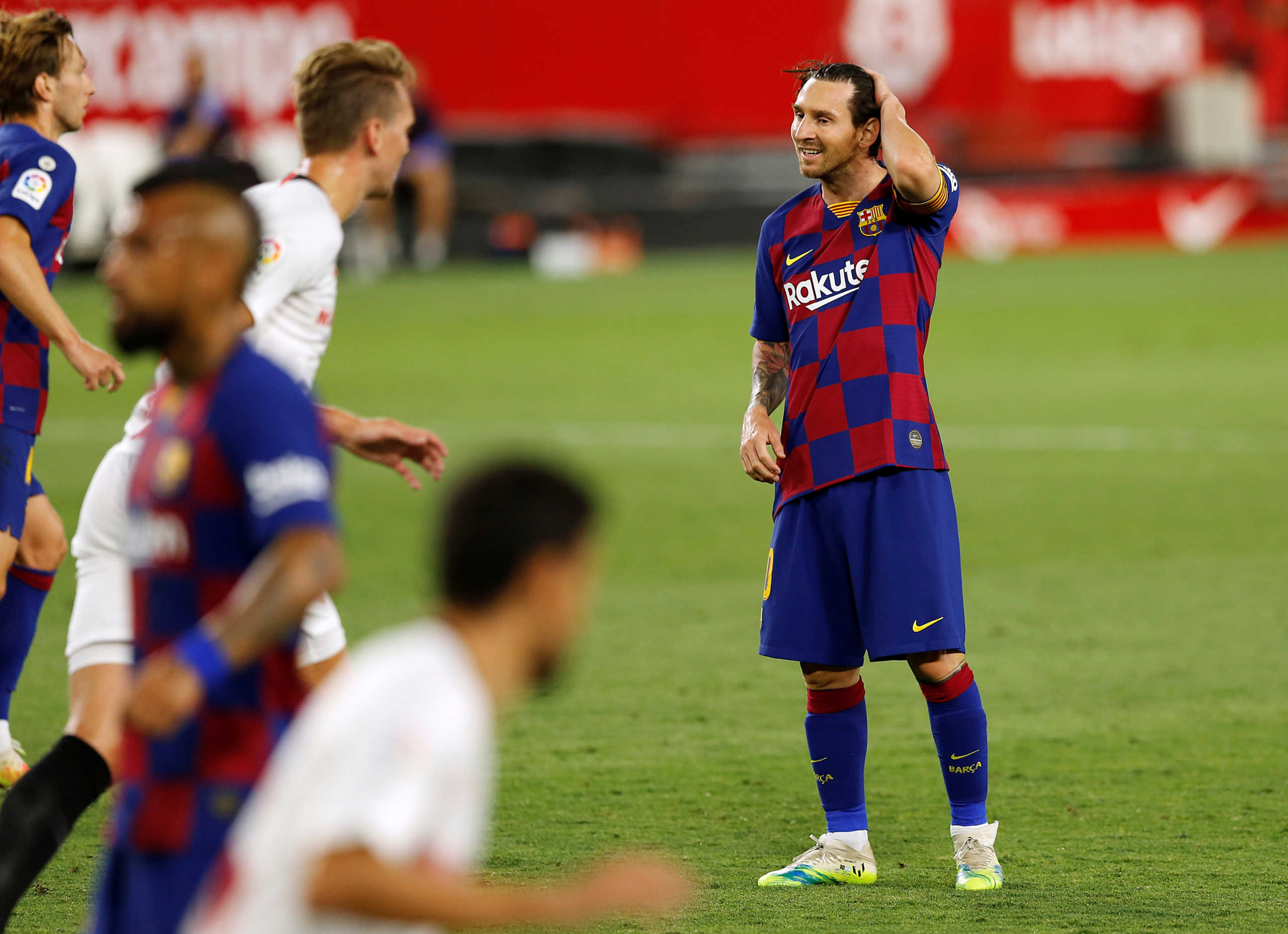Soccer Football - La Liga Santander - Sevilla v FC Barcelona - Ramon Sanchez Pizjuan, Sevilla, Spain - June 19, 2020  Barcelona's Lionel Messi reacts, as play resumes behind closed doors following the outbreak of the coronavirus disease (COVID-19)   REUTERS