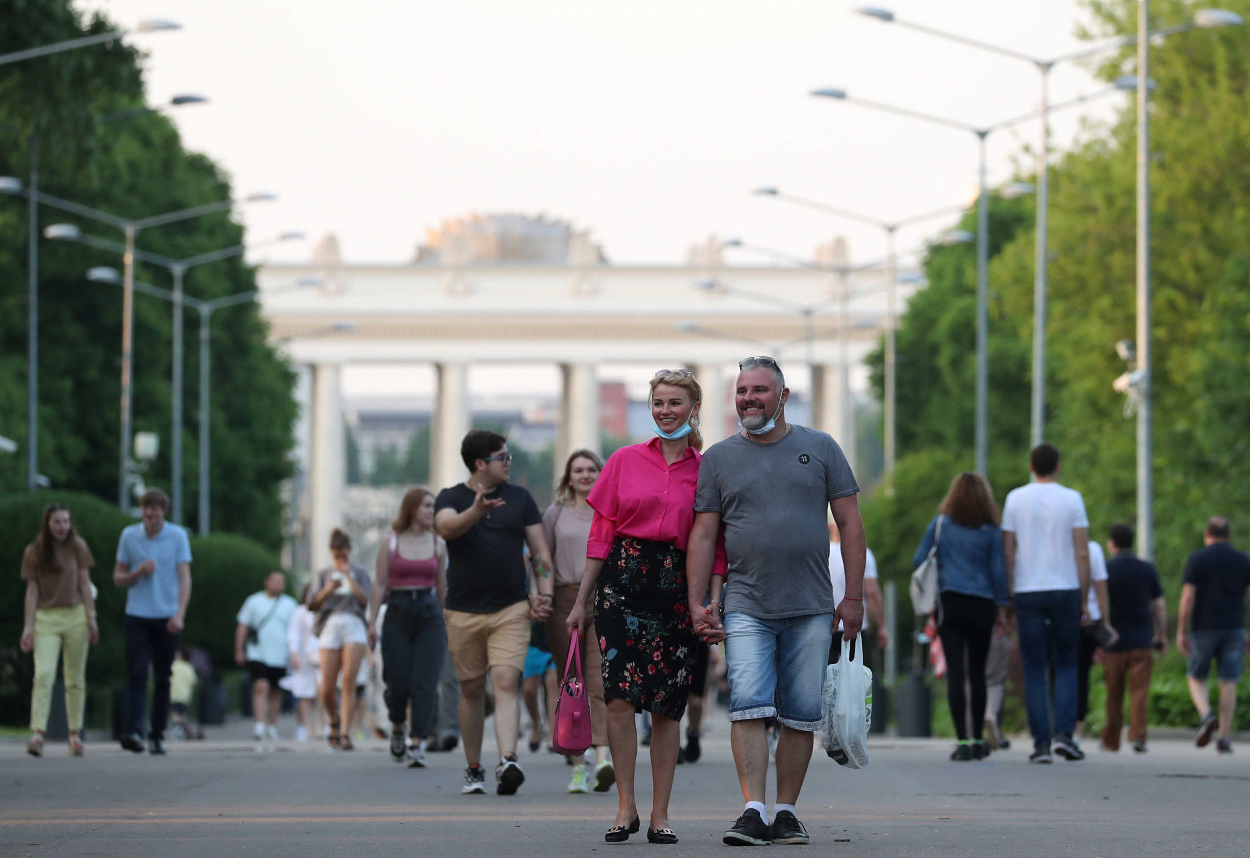 People walk at the Gorky Central Park of Culture and Leisure after local authorities partially lifted quarantine restrictions imposed to prevent the spread of the coronavirus disease (COVID-19), in Moscow, Russia June 8, 2020. REUTERS