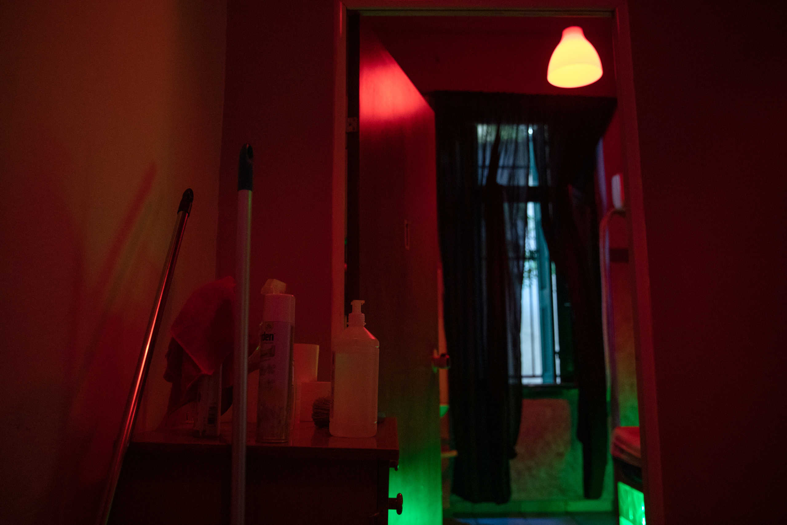 Hand sanitiser and cleaning material are placed outside a bedroom of a brothel, after the Greek government released health and safety guidelines for sex workers against the spread of coronavirus disease (COVID-19), in Athens, Greece June 17, 2020. REUTERS
