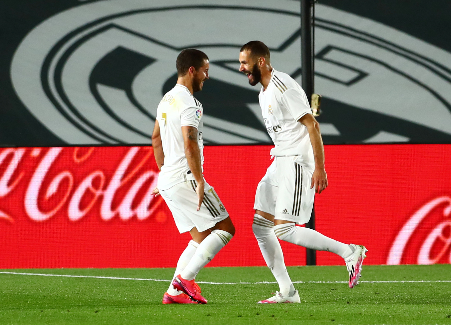 Soccer Football - La Liga Santander - Real Madrid v Valencia - Alfredo Di Stefano Stadium, Madrid, Spain - June 18, 2020   Real Madrid's Karim Benzema celebrates scoring their first goal with Eden Hazard as play resumes behind closed doors following the outbreak of the coronavirus disease (COVID-19)   REUTERS