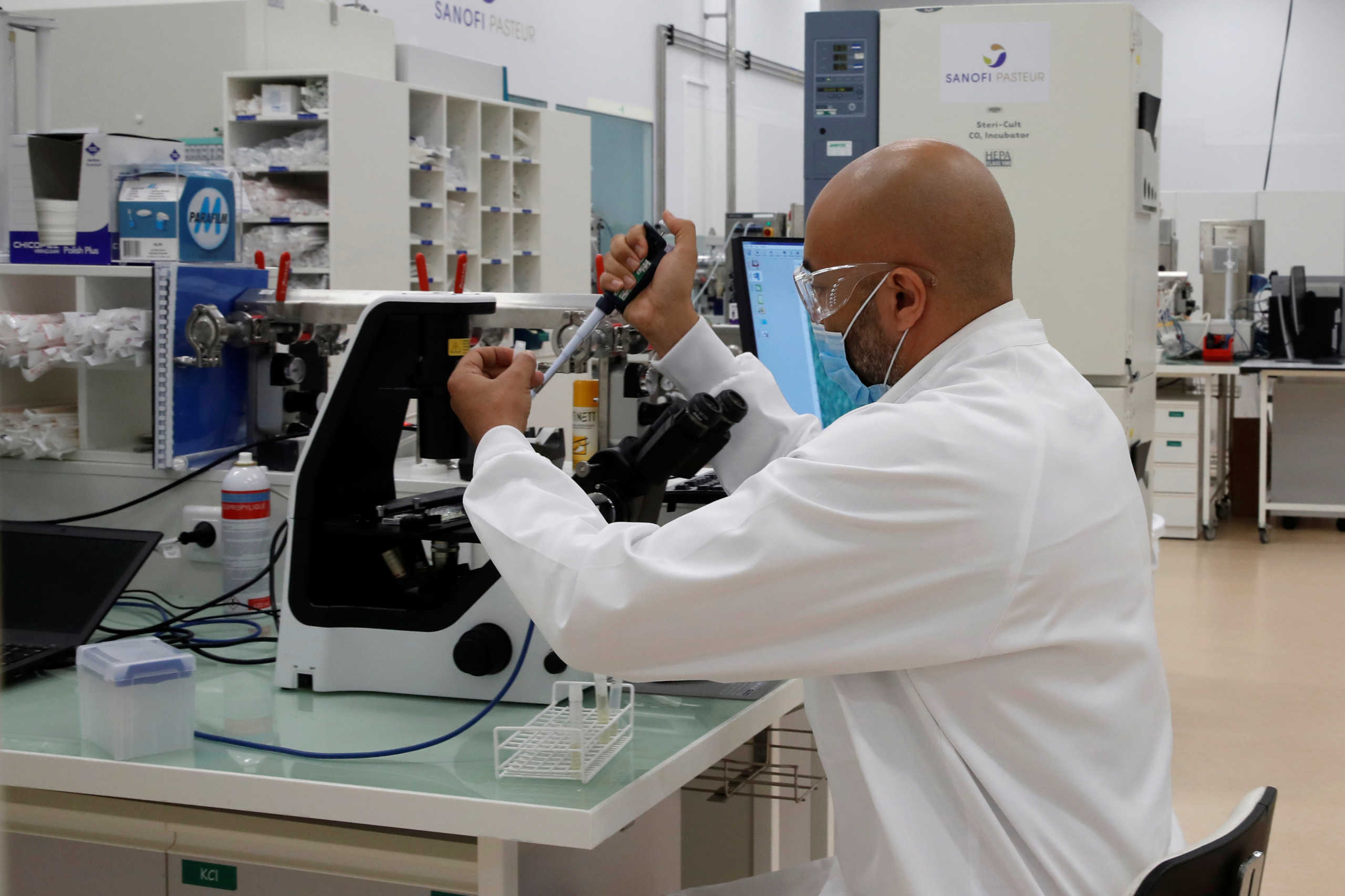 A researcher works in an industrial development laboratory at the French drugmaker's vaccine unit Sanofi Pasteur plant in Marcy-l'Etoile, near Lyon, June 16, 2020. REUTERS