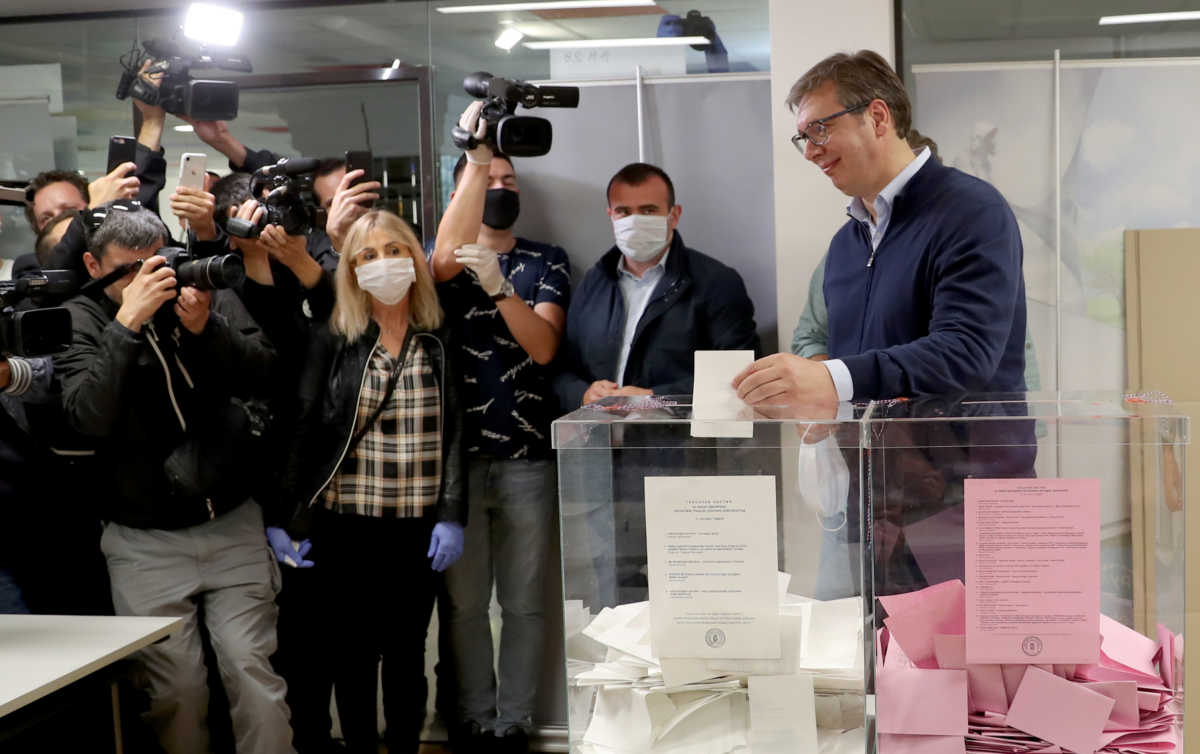 Serbian President Aleksandar Vucic casts a ballot during a national election, the first in Europe since coronavirus lockdown, at a polling station in Belgrade, Serbia, June 21, 2020. REUTERS