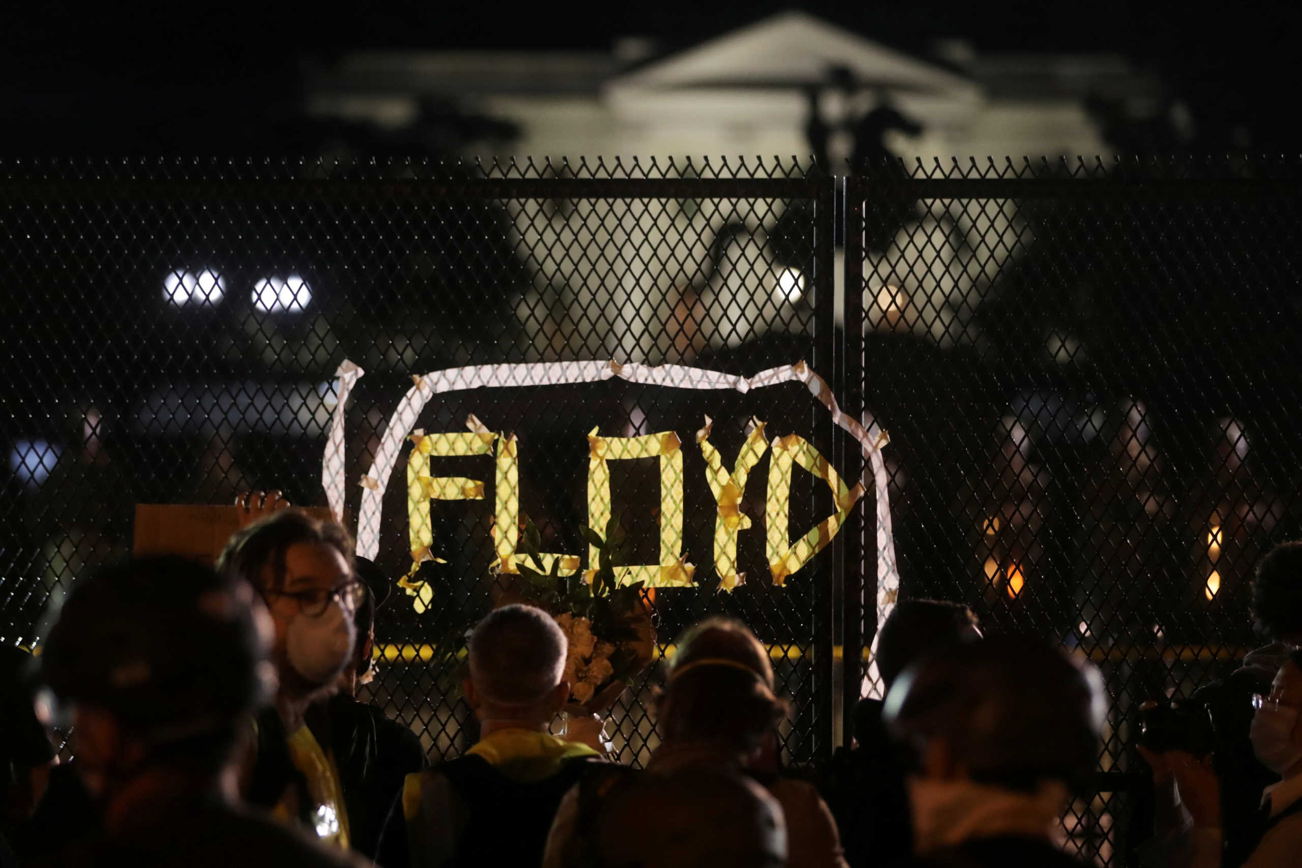 Demonstrators gather along the fence surrounding Lafayette Park outside the White House as protests continue over the death in police custody of George Floyd, in Washington, U.S., June 2, 2020. REUTERS