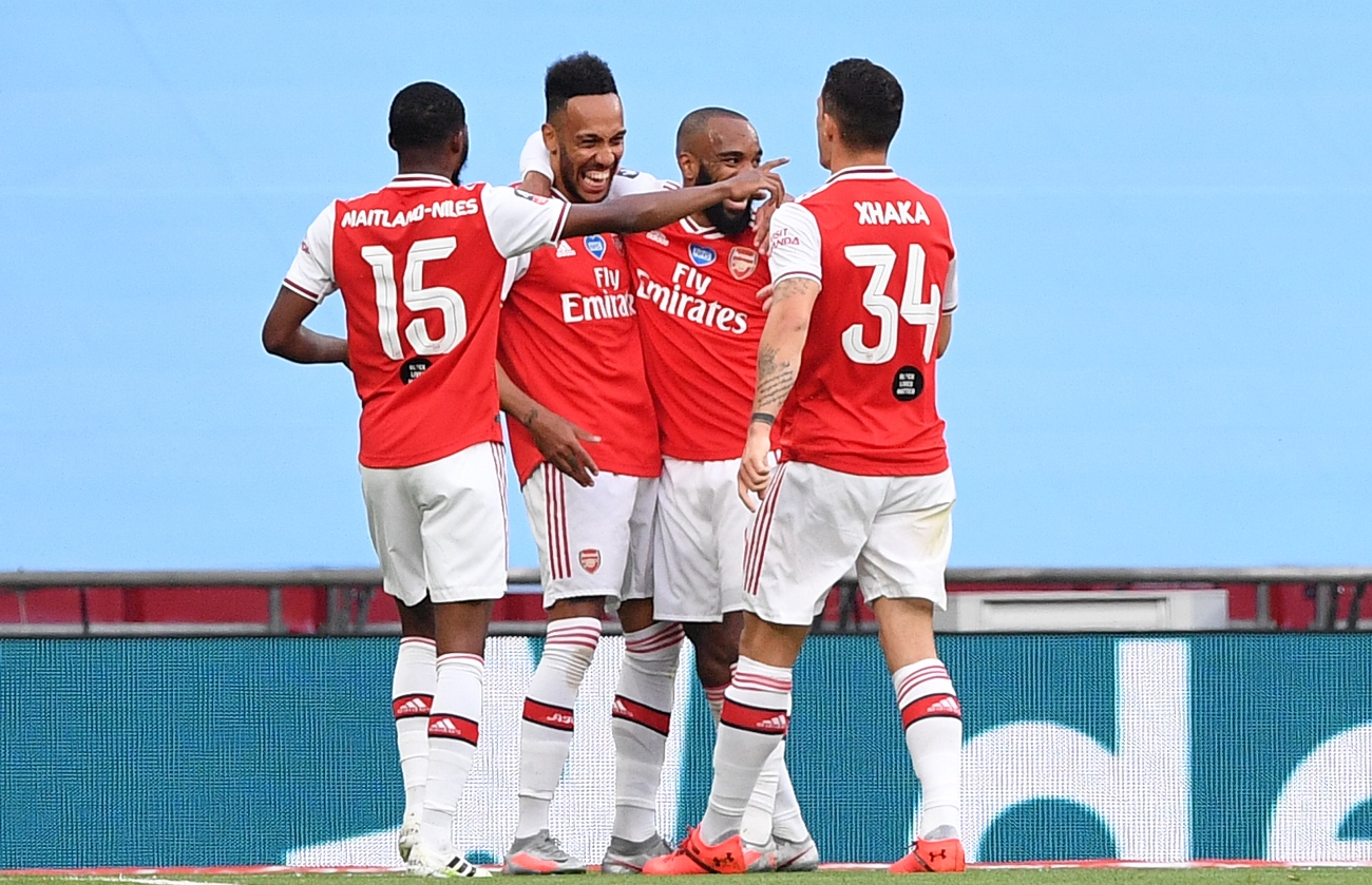 Soccer Football - FA Cup Semi Final - Arsenal v Manchester City - Wembley Stadium, London, Britain - July 18, 2020 Arsenal's Pierre-Emerick Aubameyang celebrates scoring their first goal with Alexandre Lacazette and teammates, as play resumes behind closed doors following the outbreak of the coronavirus disease (COVID-19) Justin Tallis