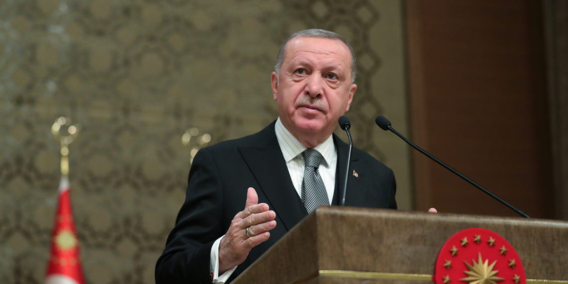 Turkish President Tayyip Erdogan speaks during a symposium in Ankara, Turkey, January 2, 2020. Murat Cetinmuhurdar