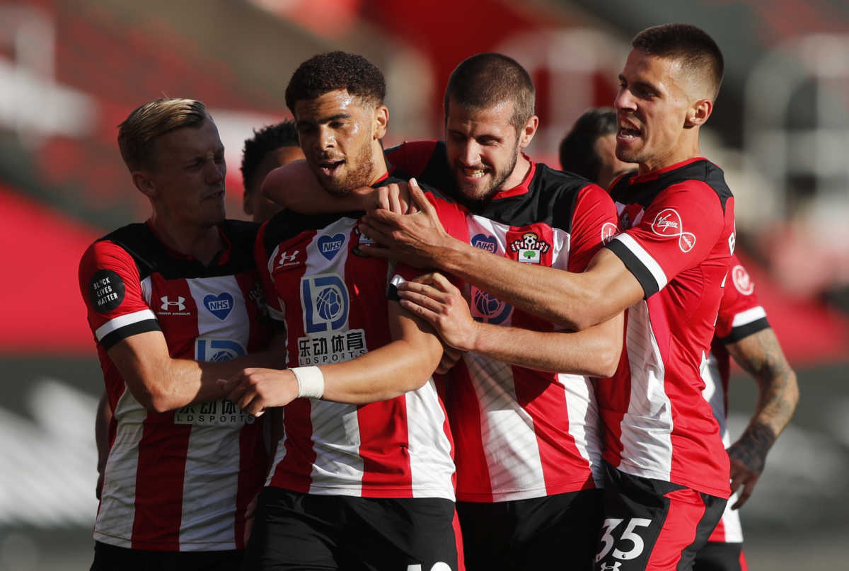 Soccer Football - Premier League - Southampton v Manchester City - St Mary's Stadium, Southampton, Britain - July 5, 2020  Southampton's Che Adams celebrates scoring their first goal with teammates, as play resumes behind closed doors following the outbreak of the coronavirus disease (COVID-19) Frank Augstein