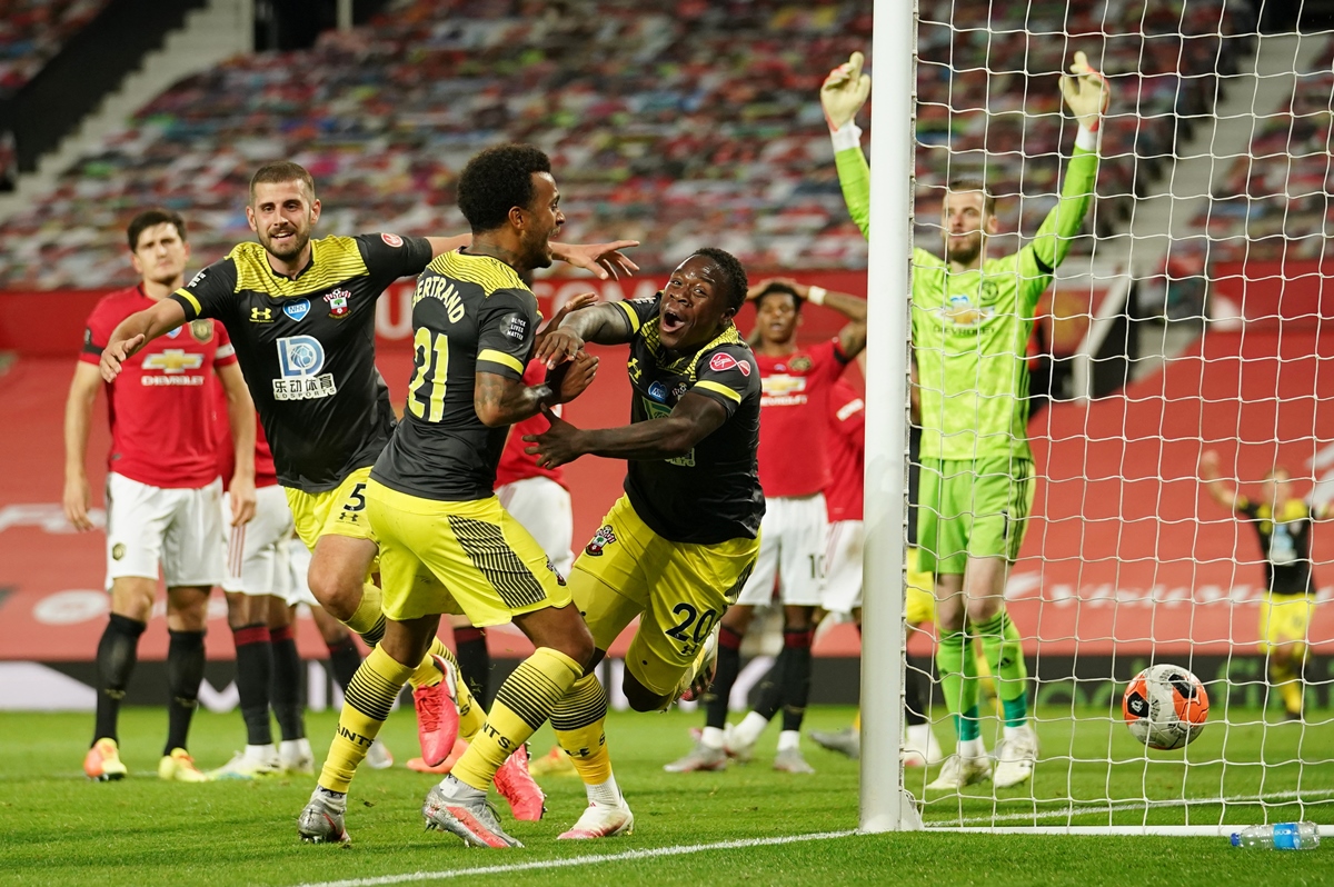 Soccer Football - Premier League - Manchester United v Southampton - Old Trafford, Manchester, Britain - July 13, 2020 Southampton's Michael Obafemi celebrates scoring their second goal, as play resumes behind closed doors following the outbreak of the coronavirus disease (COVID-19) Pool via REUTERS