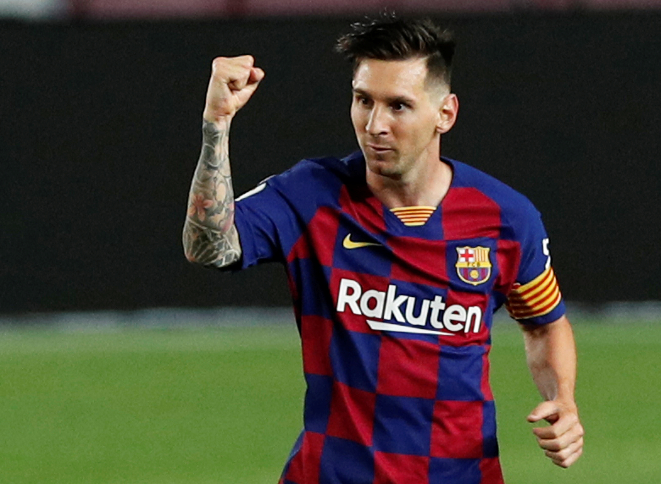 Soccer Football - La Liga Santander - FC Barcelona v Atletico Madrid - Camp Nou, Barcelona, Spain - June 30, 2020  Barcelona's Lionel Messi celebrates scoring their second goal, as play resumes behind closed doors following the outbreak of the coronavirus disease (COVID-19)   REUTERS