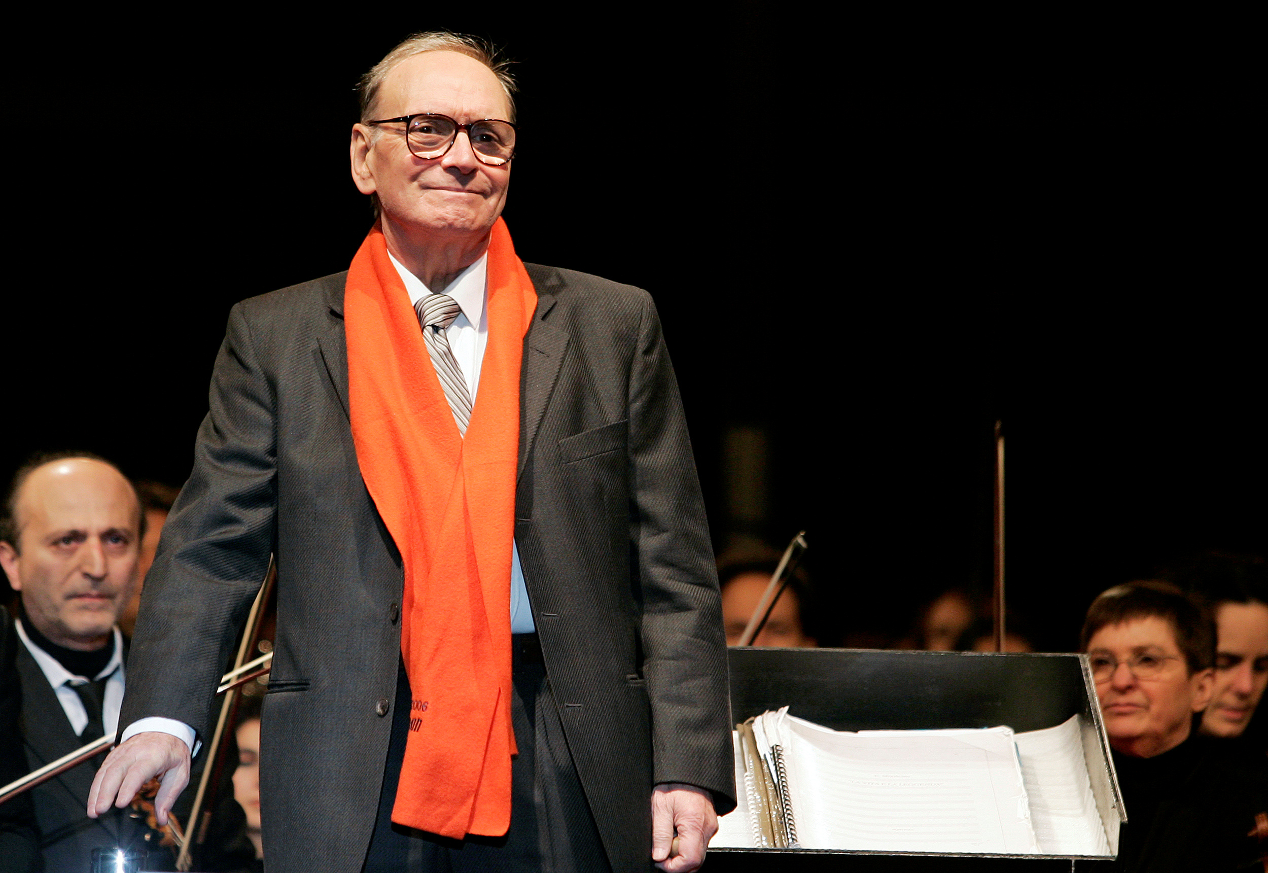 FILE PHOTO: Italian movie composer Ennio Morricone conducts the Sinfonietta orchestra during a Christmas concert in Milan December 16, 2006. REUTERS