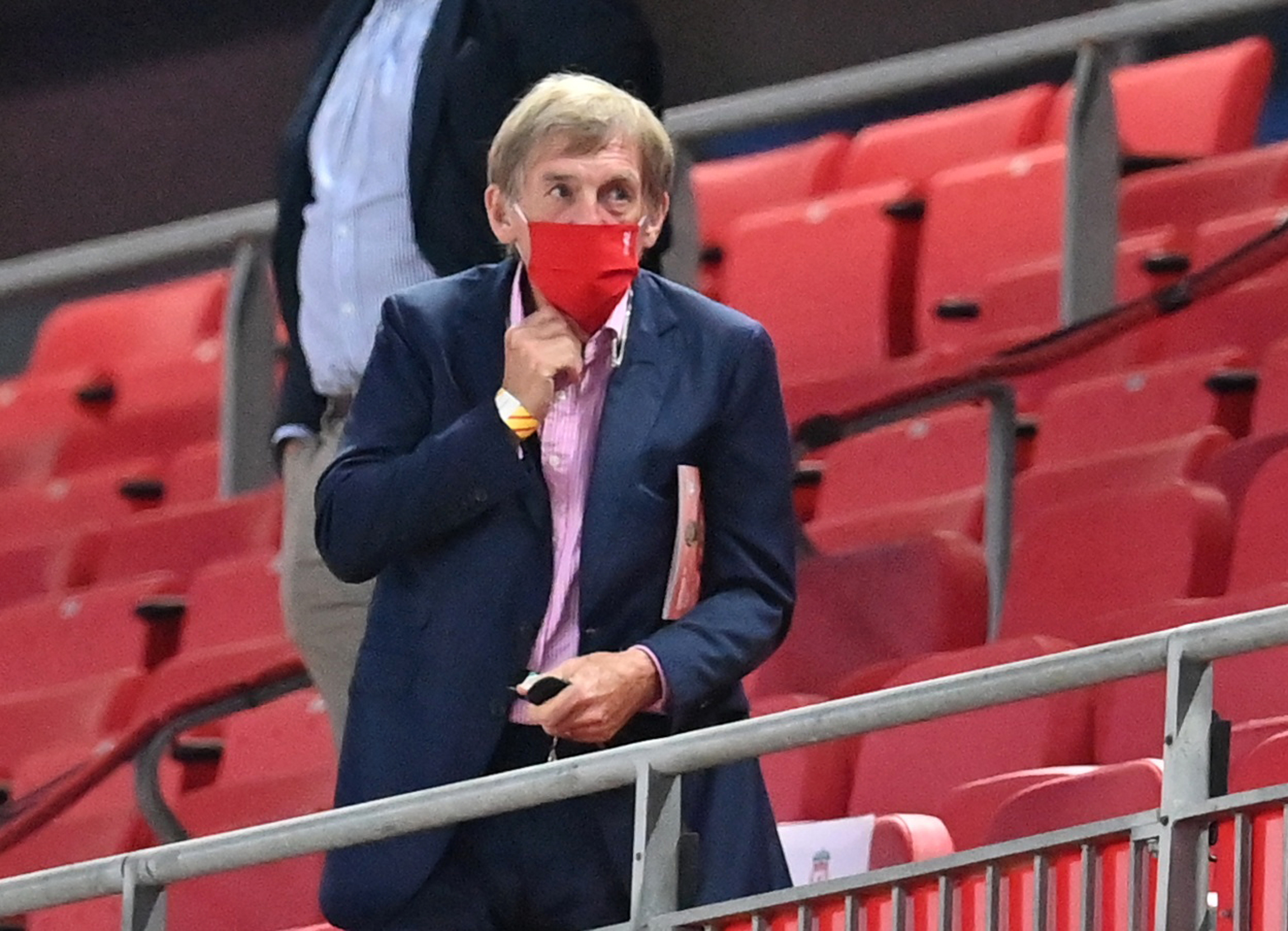 Soccer Football - Premier League - Liverpool v Crystal Palace - Anfield, Liverpool, Britain - June 24, 2020 Former Liverpool player Kenny Dalglish wearing a face mask in the stands as play resumes behind closed doors following the outbreak of the coronavirus disease (COVID-19) Paul Ellis