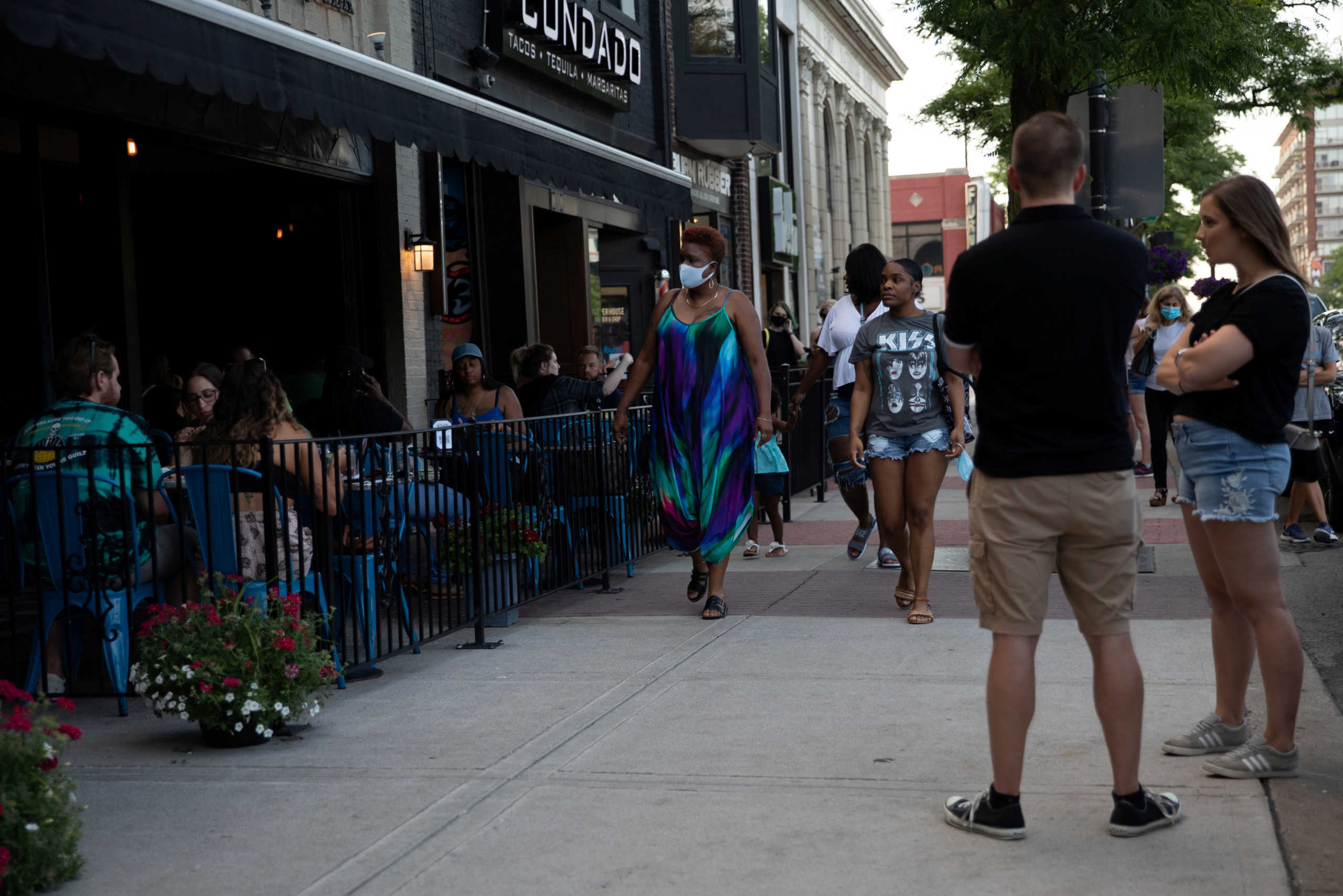 People crowd restaurants and sidewalks amid the coronavirus disease (COVID-19) outbreak in Royal Oak, Michigan, U.S., June 30, 2020.  REUTERS
