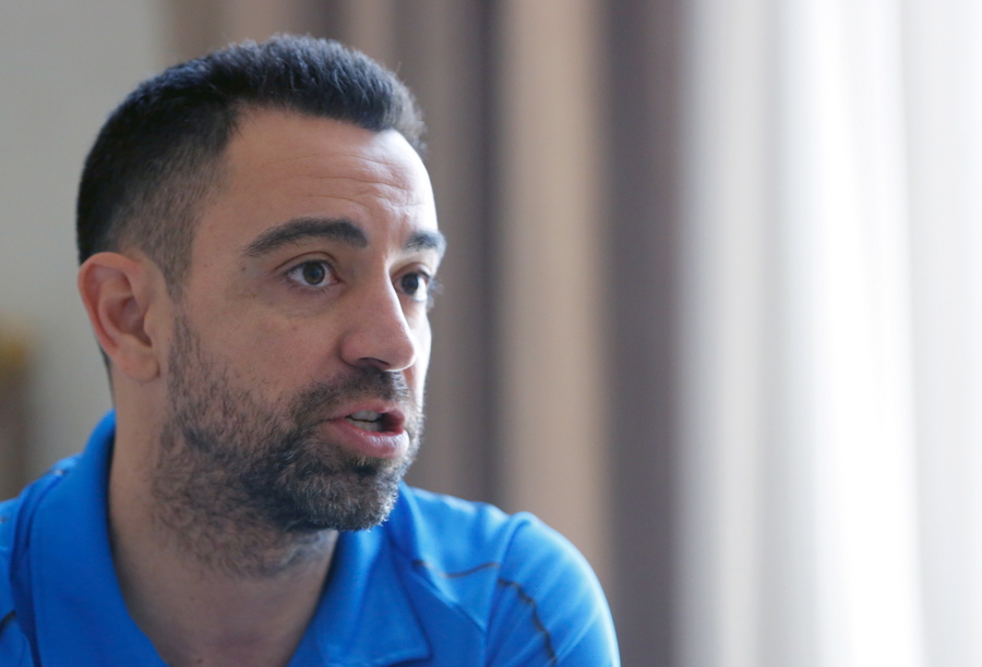 epa08342732 (FILE) - Former Barcelona soccer player and current coach of Al-Sadd, Spanish Xavier Hernandez, reacts during an interview  in a hotel in Tehran, Iran, 20 May 2019. Xavi and his wife donated 1 million Euro to the hospital CLINIC in Barcelona, as he said in a video message that they "want to give their contribution in the fight against Corona."  EPA