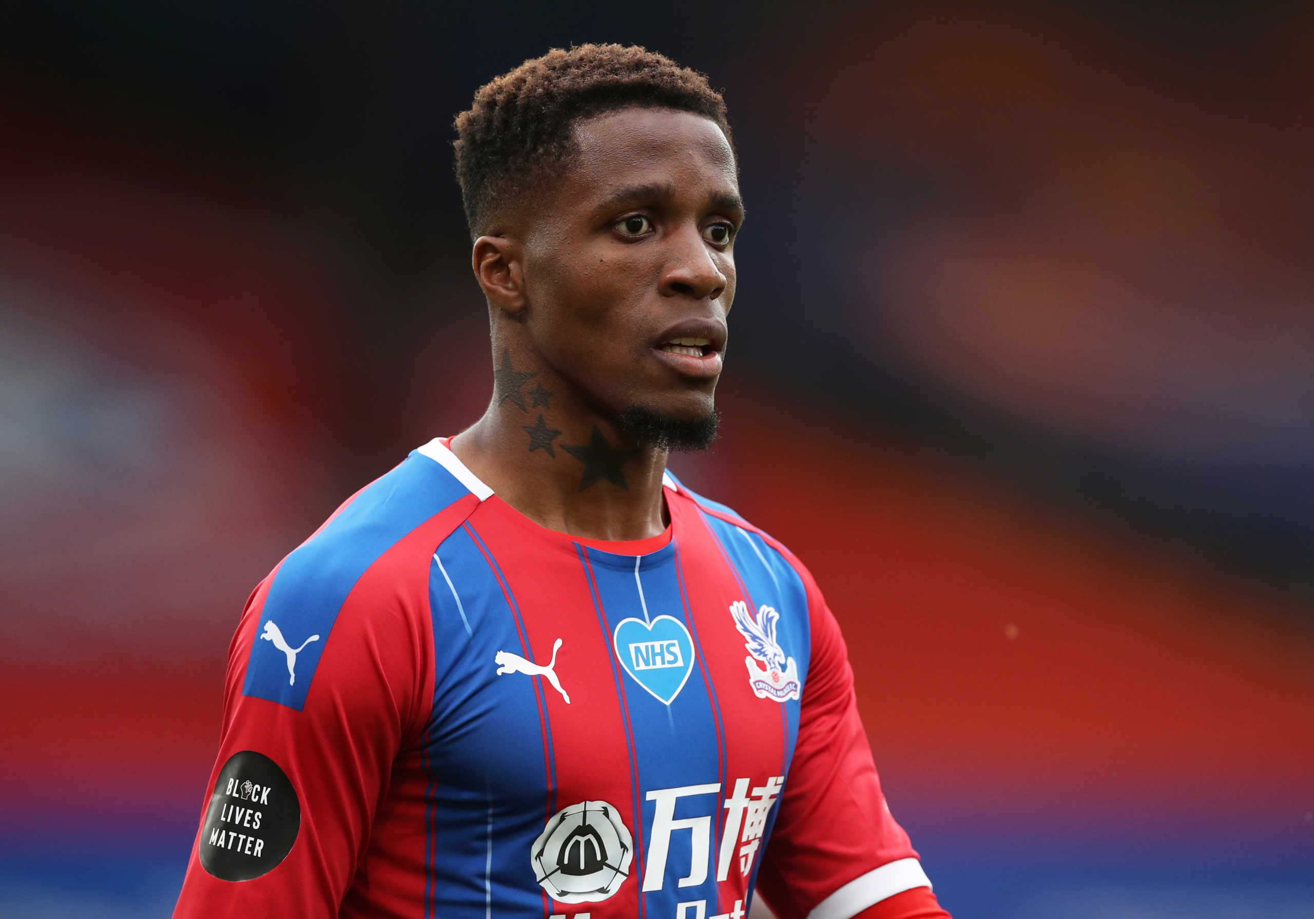 Soccer Football - Premier League - Crystal Palace v Chelsea - Selhurst Park, London, Britain - July 7, 2020  Crystal Palace's Wilfried Zaha, as play resumes behind closed doors following the outbreak of the coronavirus disease (COVID-19)  REUTERS