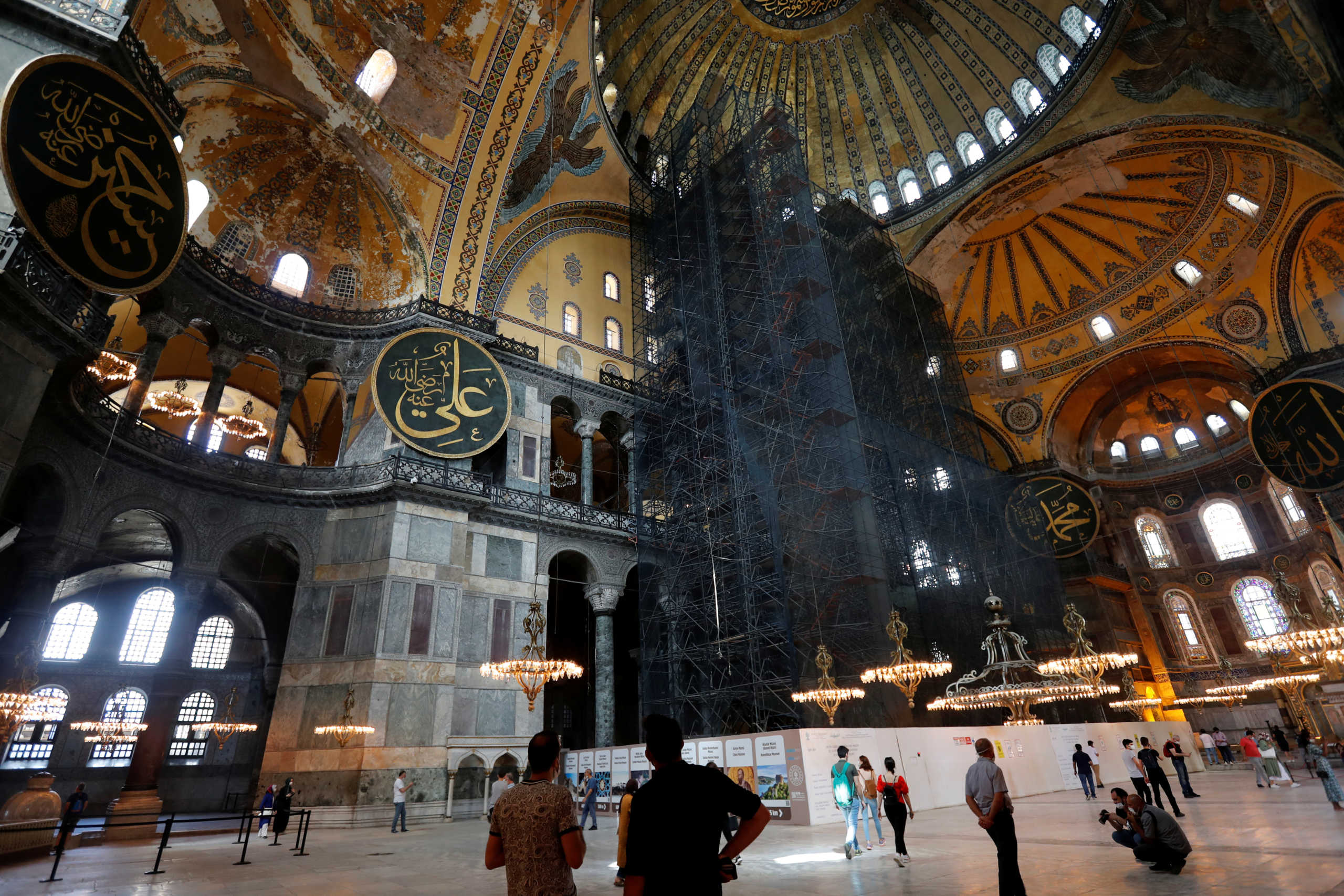 People visit the Hagia Sophia or Ayasofya, a UNESCO World Heritage Site, which was a Byzantine cathedral before being converted into a mosque and currently a museum, in Istanbul, Turkey, July 10, 2020. REUTERS