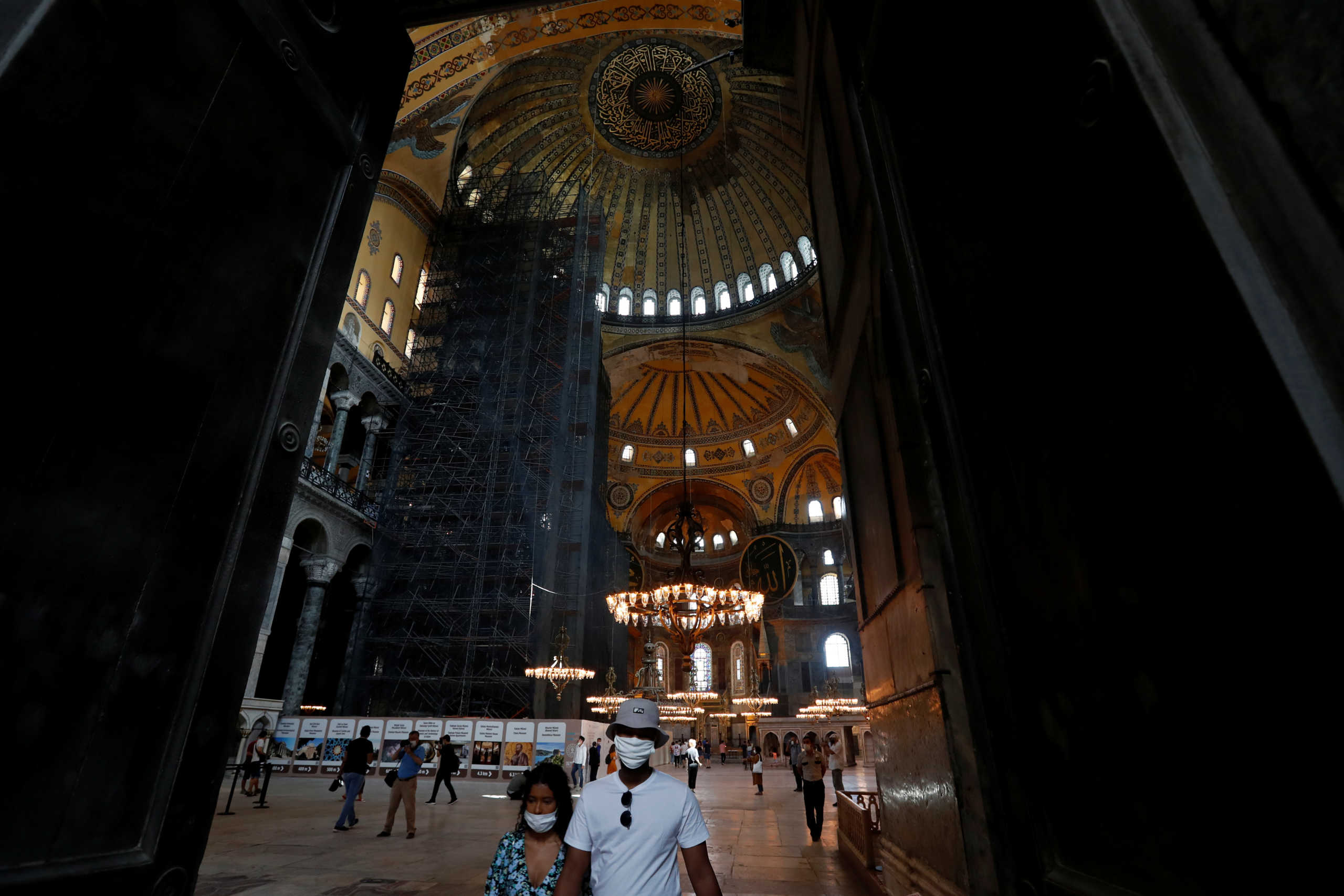 People visit the Hagia Sophia or Ayasofya, a UNESCO World Heritage Site, which was a Byzantine cathedral before being converted into a mosque and currently a museum, in Istanbul, Turkey, July 10, 2020. REUTERS