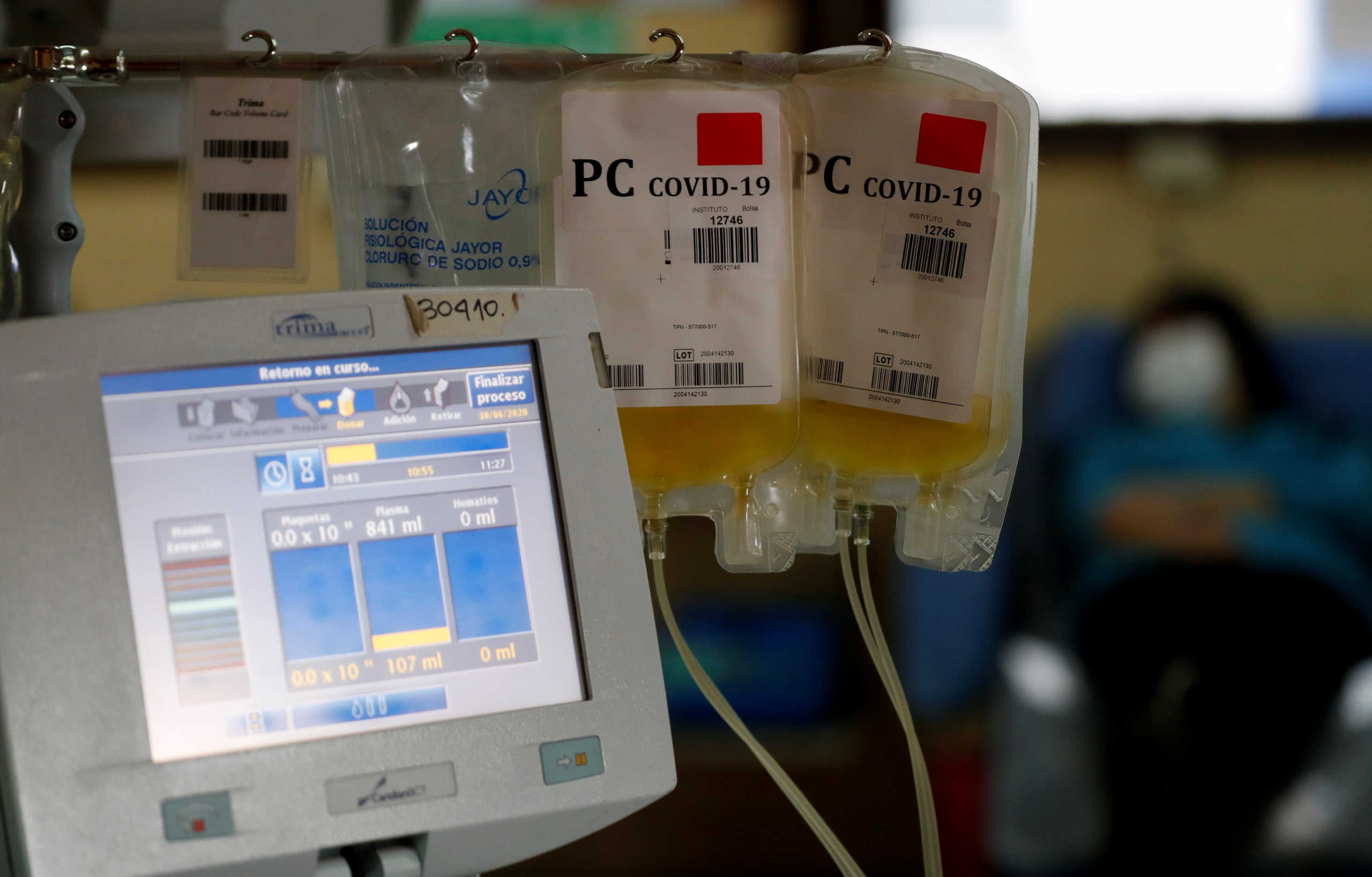Bags are filled with convalescent plasma donated from Daiana Woloszczuk, 34, who has recovered from the coronavirus disease (COVID-19), at the Hemotherapy Institute in La Plata, Argentina June 30, 2020. Picture taken June 30, 2020. REUTERS
