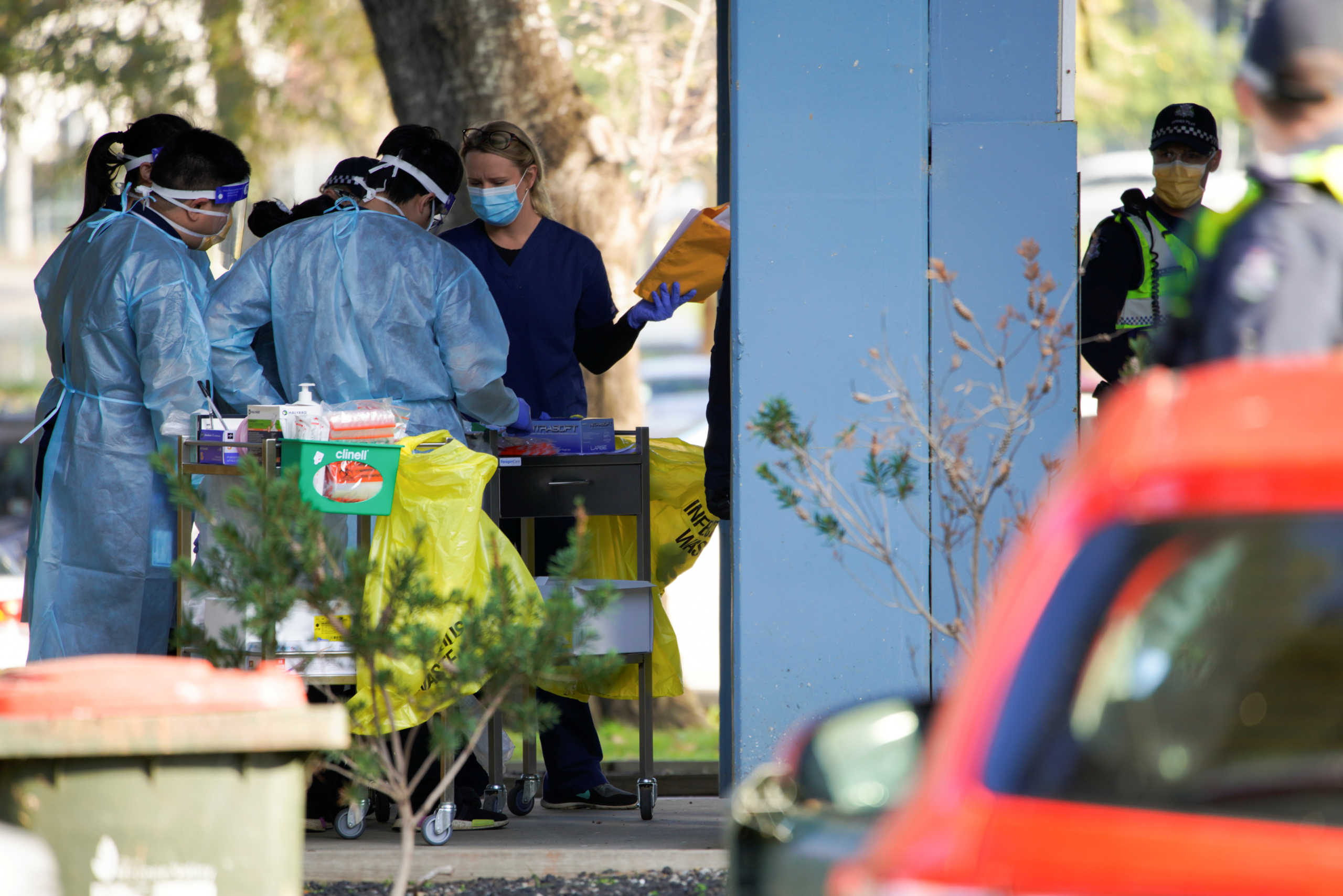Response personnel participate in a briefing outside a public housing tower, locked down in response to an outbreak of the coronavirus disease (COVID-19), in Melbourne, Australia, July 8, 2020. REUTERS