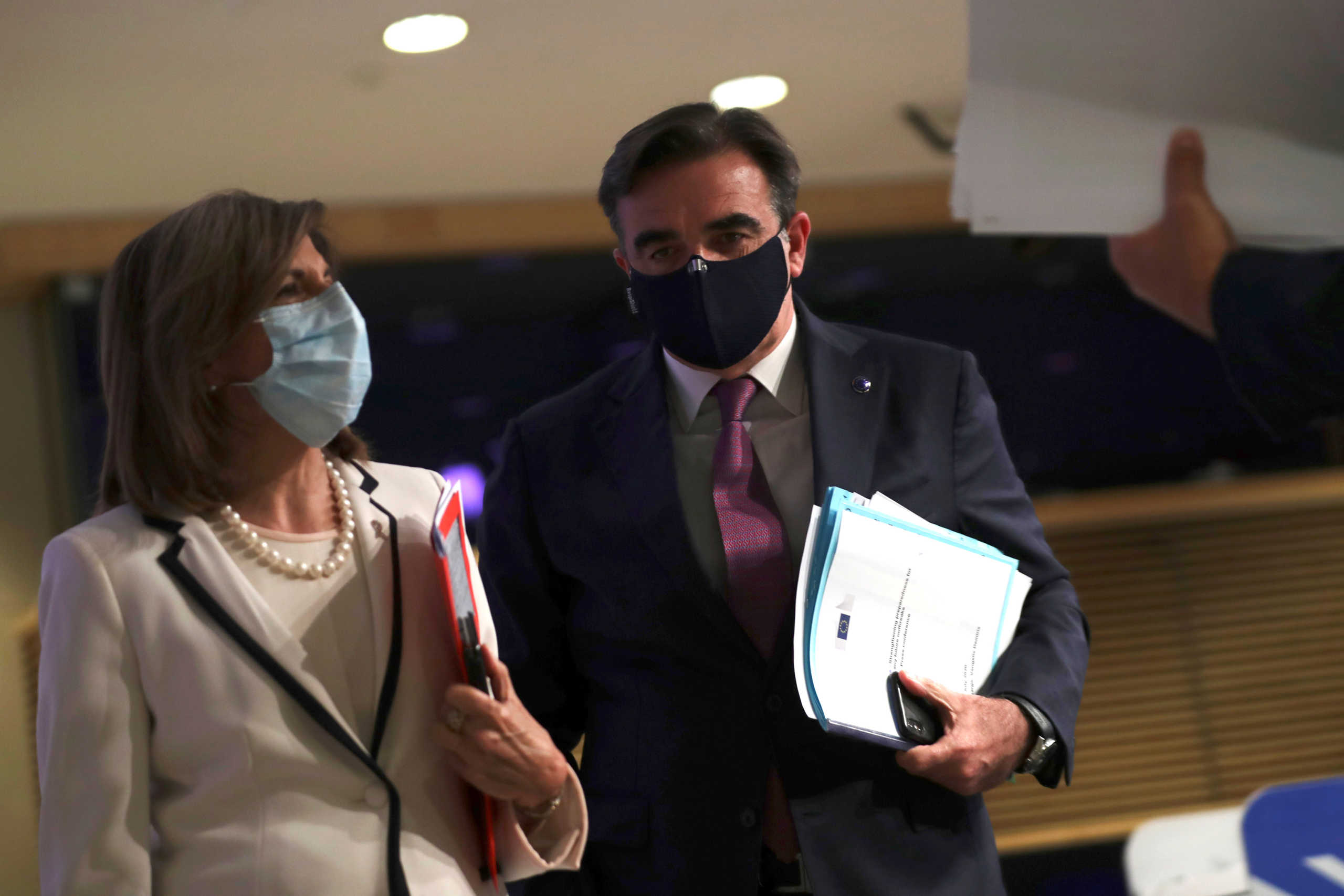 European Commission Vice-President Margaritis Schinas and European Health Commissioner Stella Kyriakides leave the podium after addressing a media conference on preparedness for possible future outbreaks of the coronavirus disease (COVID-19), at EU headquarters in Brussels, Belgium July 15, 2020. Francisco Seco