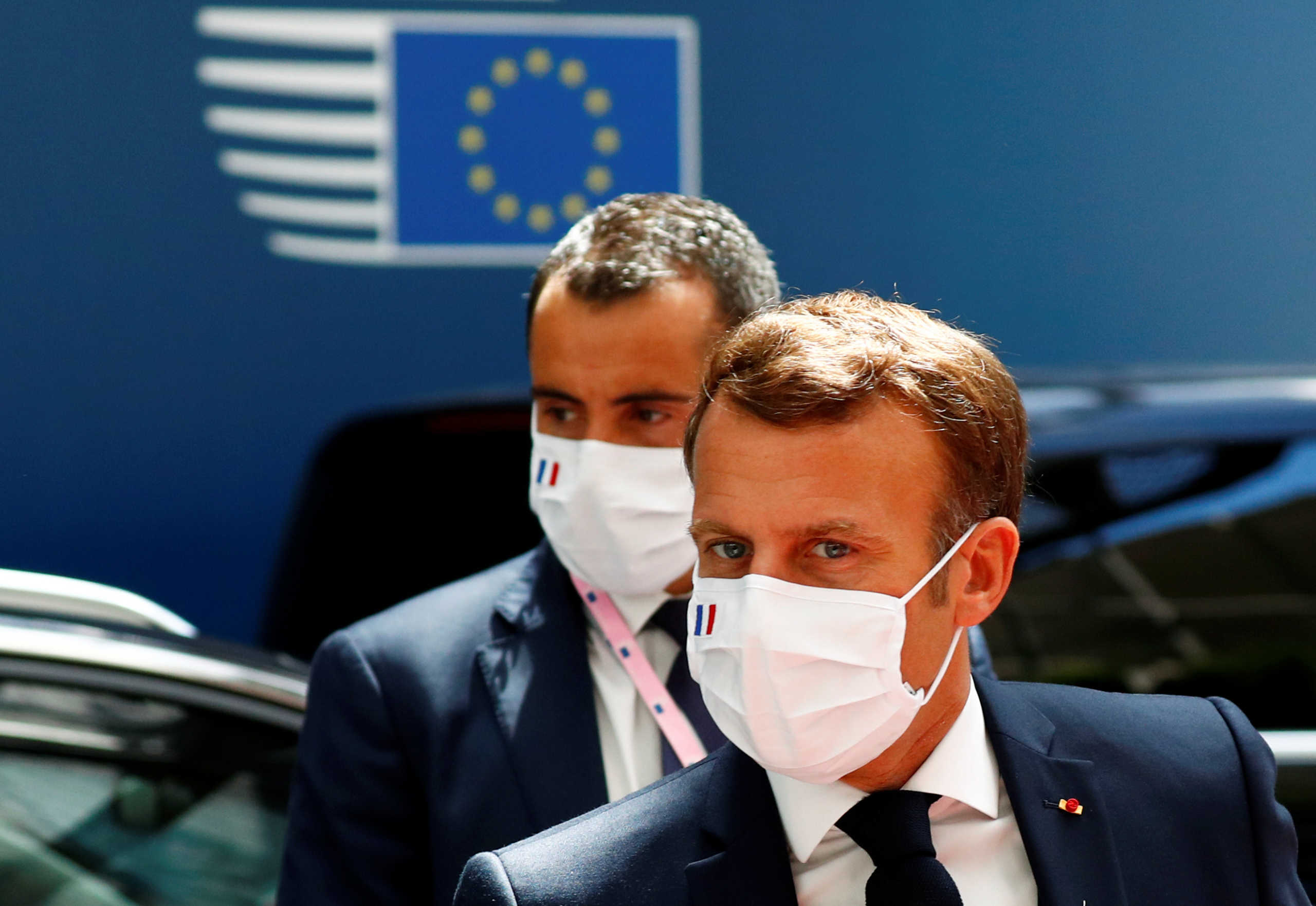 France's President Emmanuel Macron arrives for a meeting of the first face-to-face EU summit since the coronavirus disease (COVID-19) outbreak, in Brussels, Belgium July 20, 2020. REUTERS