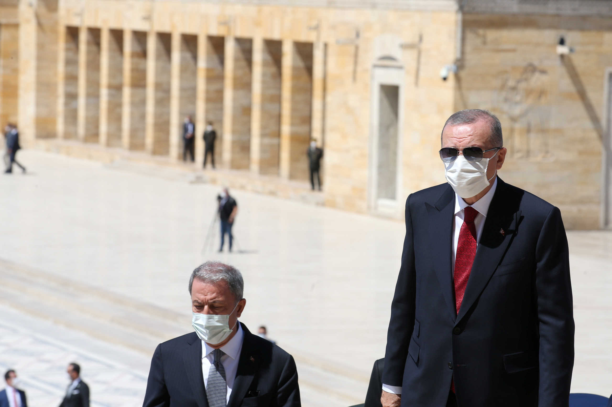 Turkey's President Tayyip Erdogan attends a wreath-laying ceremony with Defence Minister Hulusi Akar at the mausoleum of Mustafa Kemal Ataturk, founder of modern Turkey, in Ankara, Turkey, July 23, 2020. Murat Cetinmuhurdar
