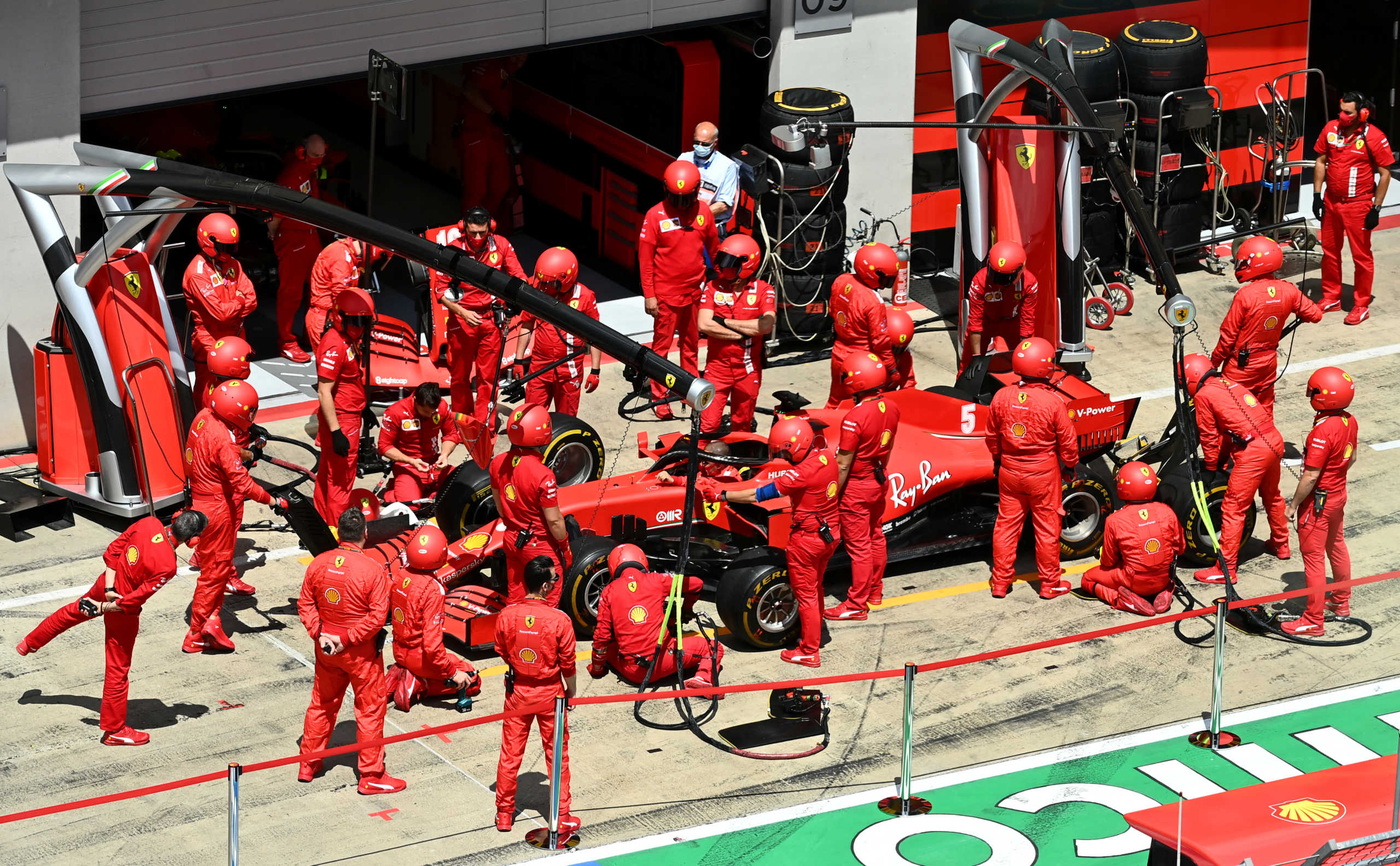 Formula One F1 - Steiermark Grand Prix - Red Bull Ring, Spielberg, Styria, Austria - July 12, 2020   Ferrari's engineers with Sebastian Vettel's car before the race, following the resumption of F1 after the outbreak of the coronavirus disease (COVID-19)    Joe Klamar