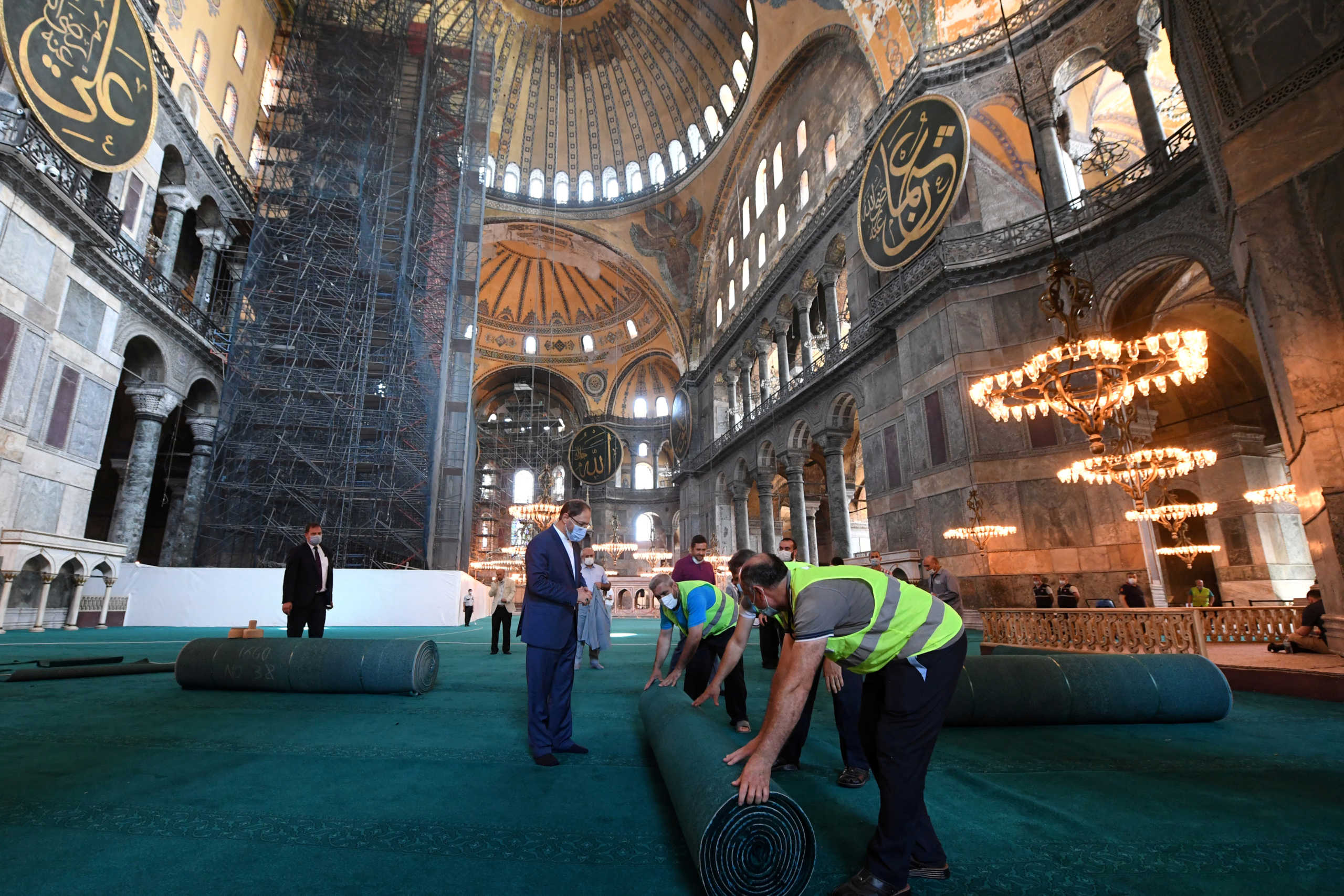 Head of Turkey's Religious Affairs Directorate Ali Erbas visits Hagia Sophia or Ayasofya-i Kebir Camii as workers lay carpets in Istanbul, Turkey, July 22, 2020. Muhammed Gun
