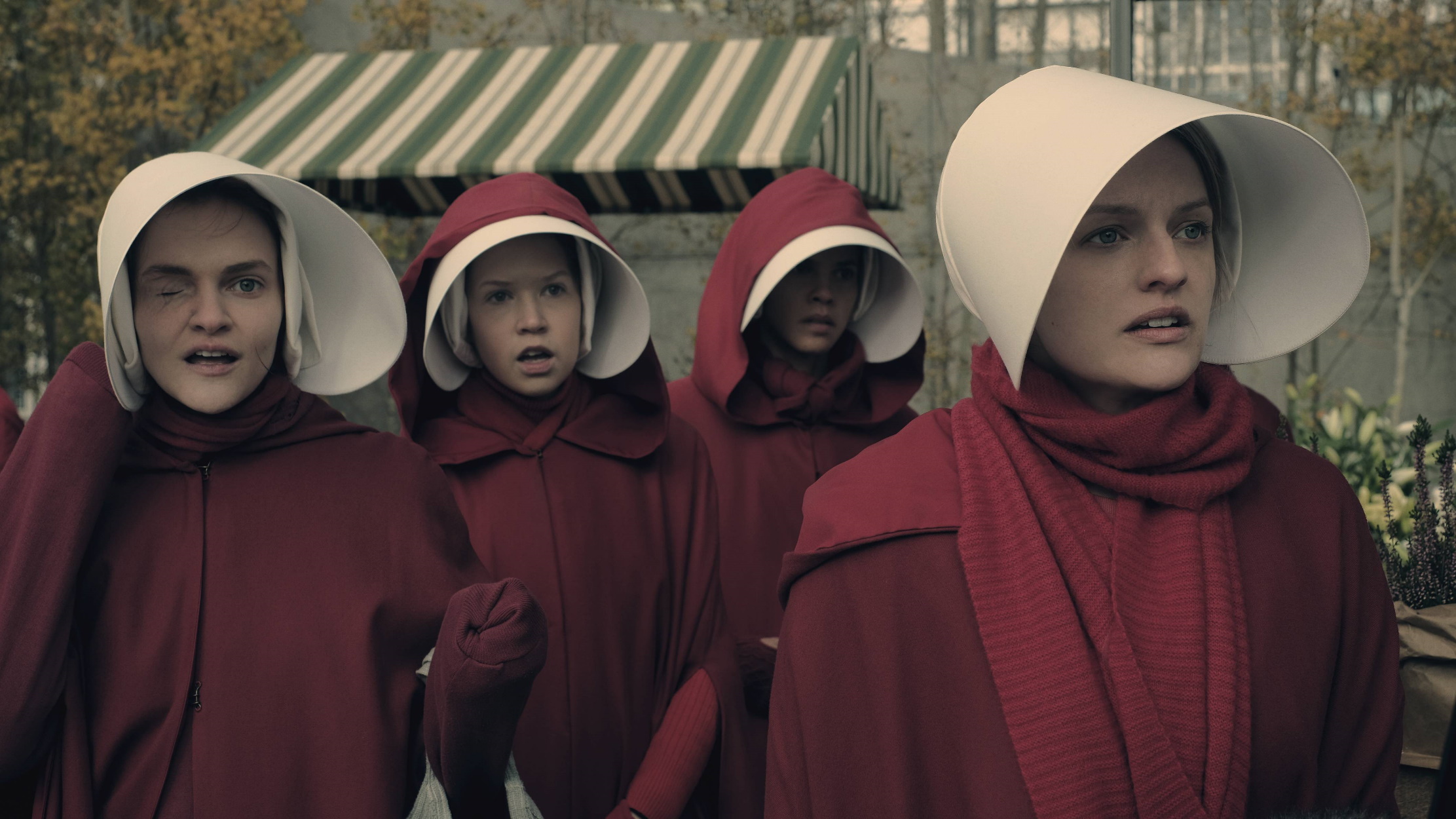 The Handmaid's Tale  -- "Faithful" -- Episode 105 --  Serena Joy makes Offred a surprising proposition. Offred remembers the unconventional beginnings of her relationship with her husband. Janine (Madeline Brewer), left and Offred (Elisabeth Moss), right, shown. (Photo by: George Kraychyk