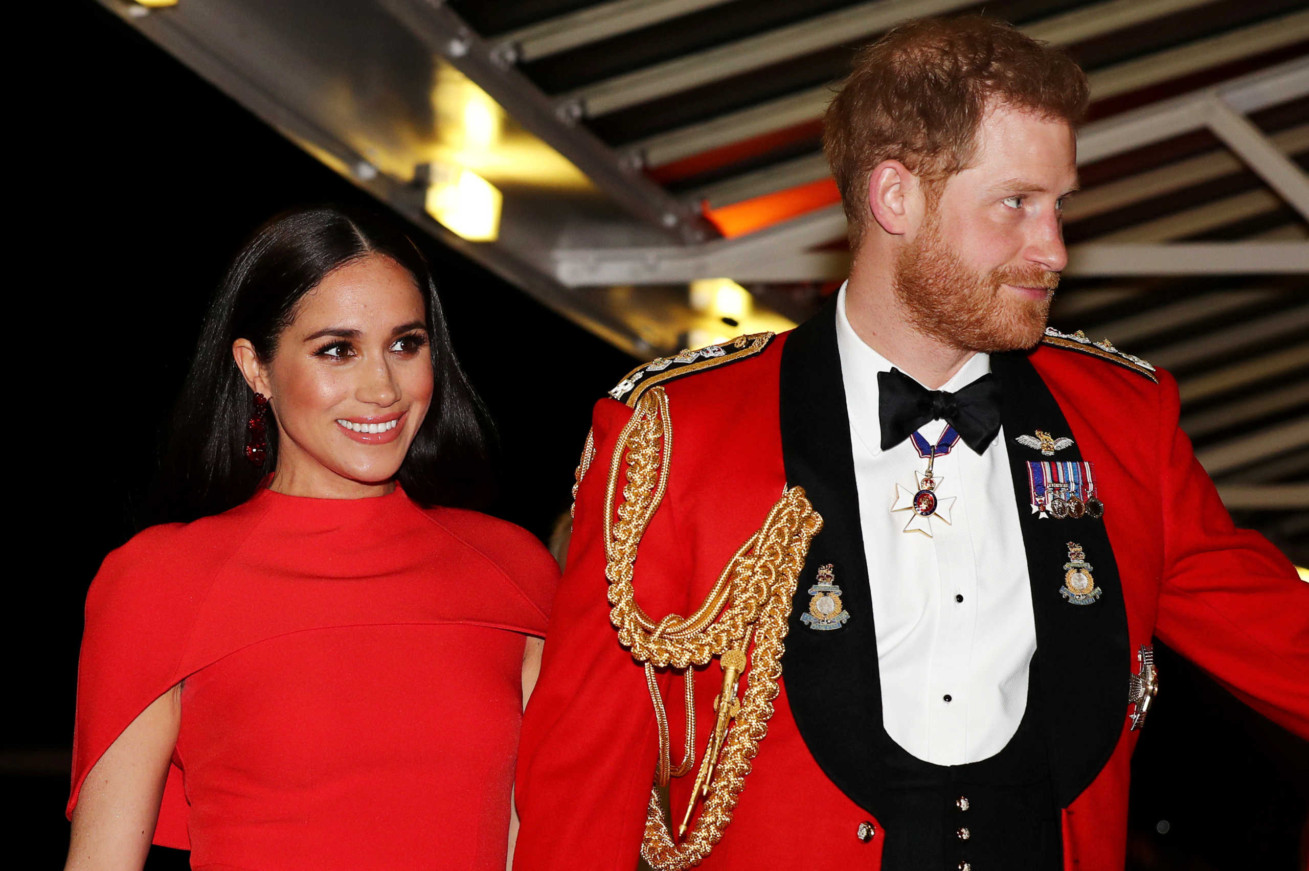 FILE PHOTO: Britain's Prince Harry and his wife Meghan, arrive to attend the Mountbatten Festival of Music at the Royal Albert Hall in London, Britain March 7, 2020. REUTERS