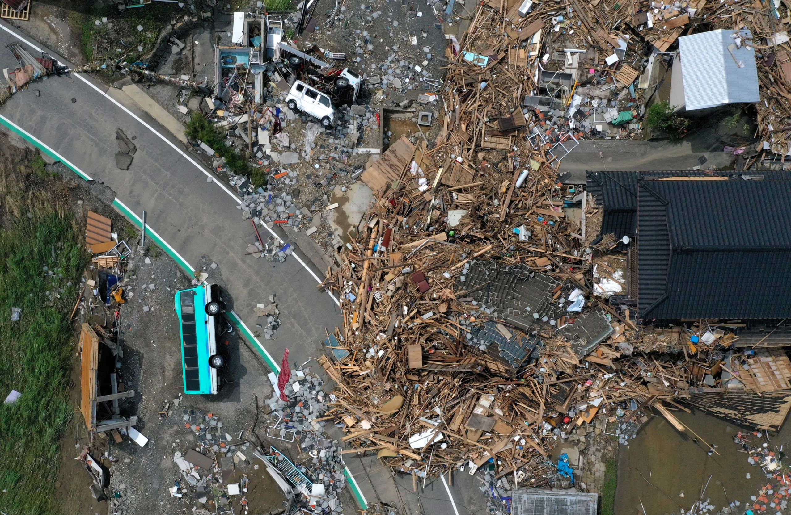 A view shows damages after floods caused by torrential rain, in Kumamura, Kumamoto Prefecture, southwestern Japan, July 8, 2020. Picture taken with a drone. REUTERS