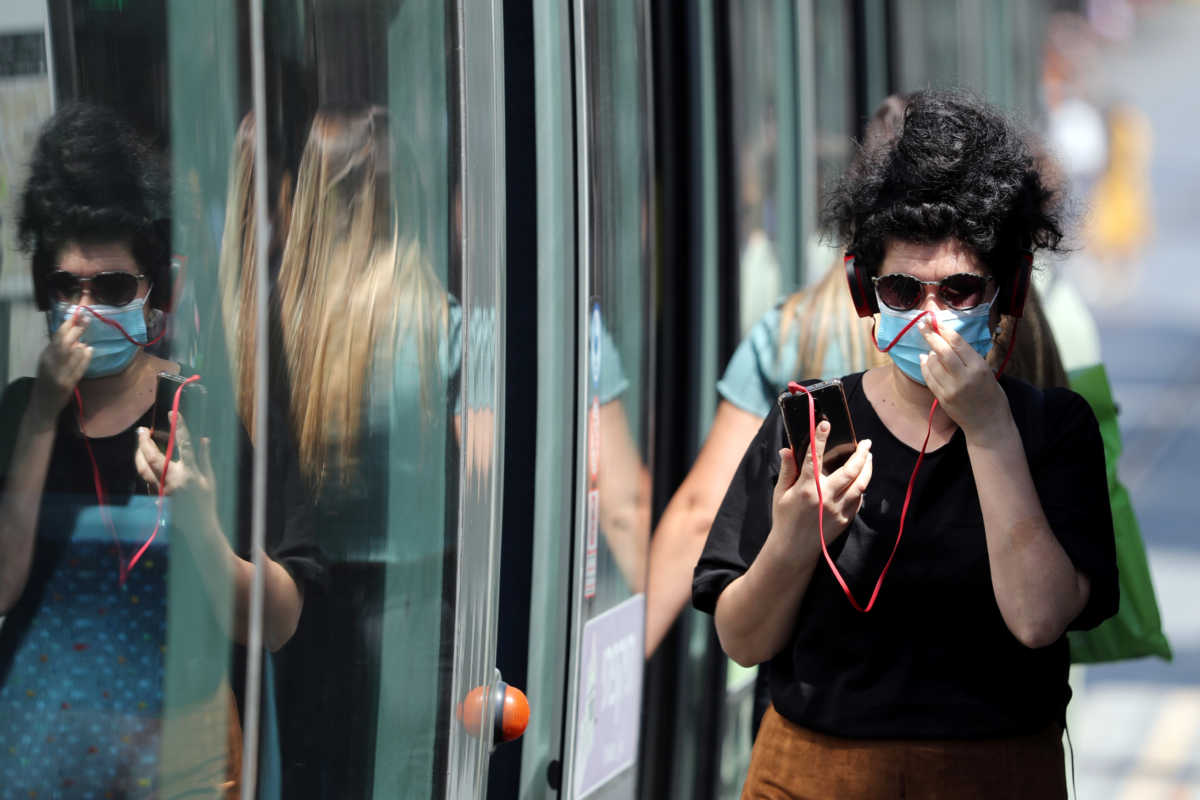 A woman wears a face mask amid the spread of the coronavirus disease (COVID-19), in central Jerusalem July 7, 2020 REUTERS